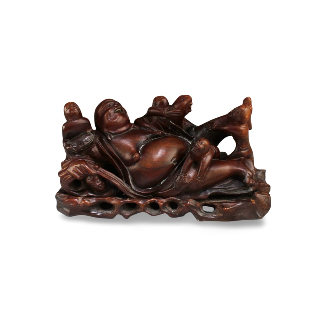 A Carved Wooden Buddha Figurine: A Carved Wooden Buddha Figurine. Length: 8"