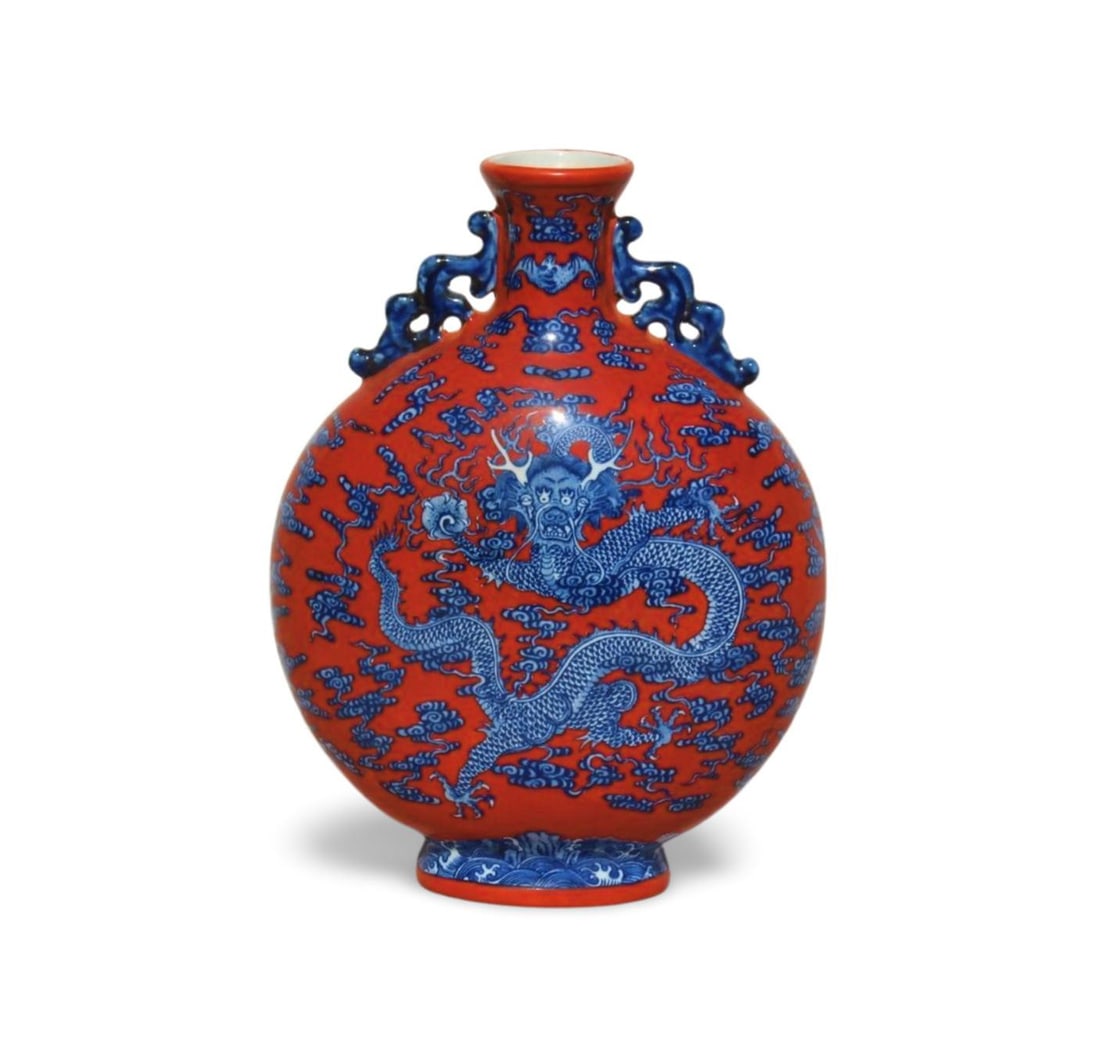A Blue and Red Moonflask Vase: A Blue and Red Moonflask Vase. Dimension: 14.2" x 10".