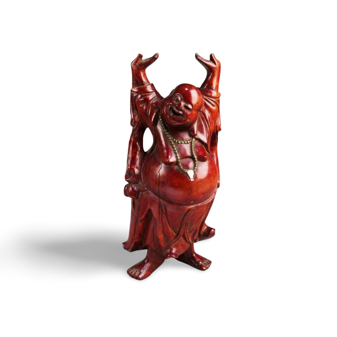 A Carved Wooden Deity Figurine: A Carved Wooden Deity Figurine. Height: 11.5"