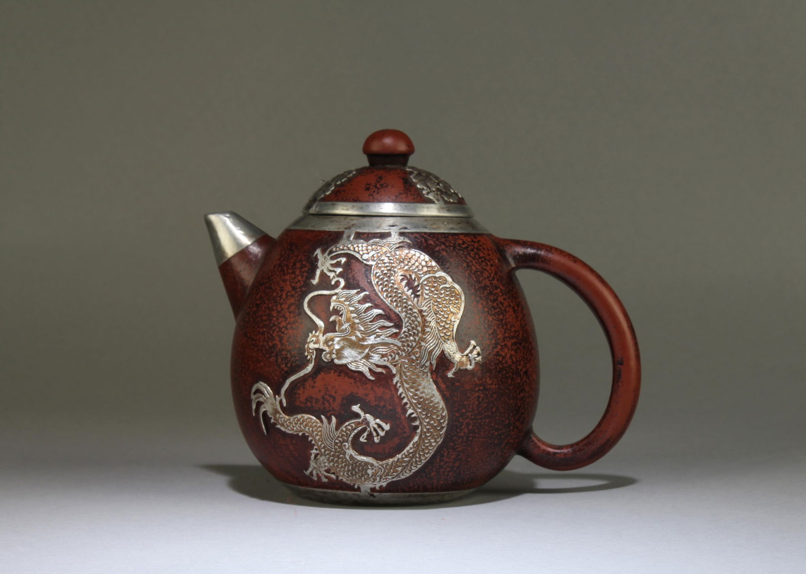 A Zisha Teapot: A Zisha Teapot. Seal mark at base. Height: 5.5" Length: 7"