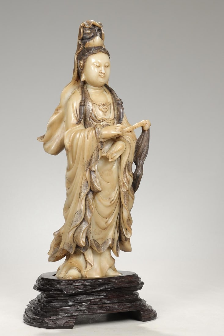 A Shoushan Stone Guanyin Ornament: A Shoushan Stone Guanyin Ornament. Height: 10.24in; Width: 3.35in; Weight: 3.08lbs.