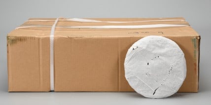 A Pu’er Tea Cake: A Pu’er Tea Cake. Total Weight: 33.06 lb.