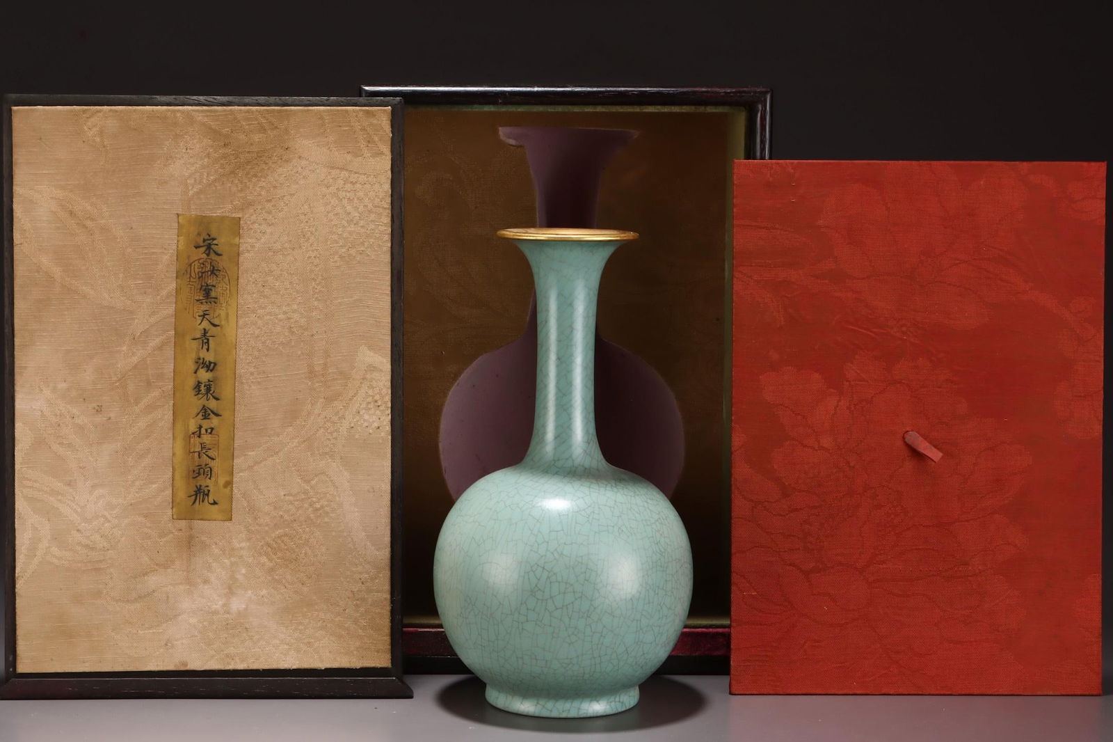 A Ru Ware Celadon Glazed Long-Neck Vase With Gilt Rim: A Ru Ware Celadon Glazed Long-Neck Vase With Gilt Rim. Height: 10.71in Width: 5.71in.