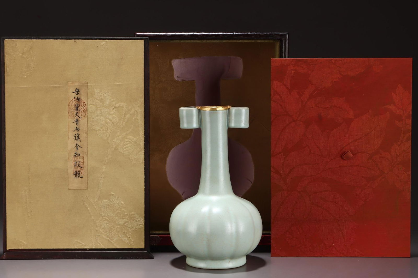 A Ru Ware Celadon Glazed Pouring Vessel With Gilt Rim: A Ru Ware Celadon Glazed Pouring Vessel With Gilt Rim. Height: 9.37in Width: 5.51in.