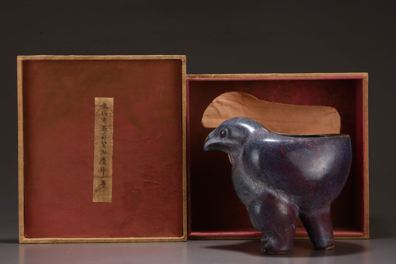 A Jun Ware Purple Glazed Eagle-Form Zun: A Jun Ware Purple Glazed Eagle-Form Zun. Dimensions: 7.87in x 8.86in.