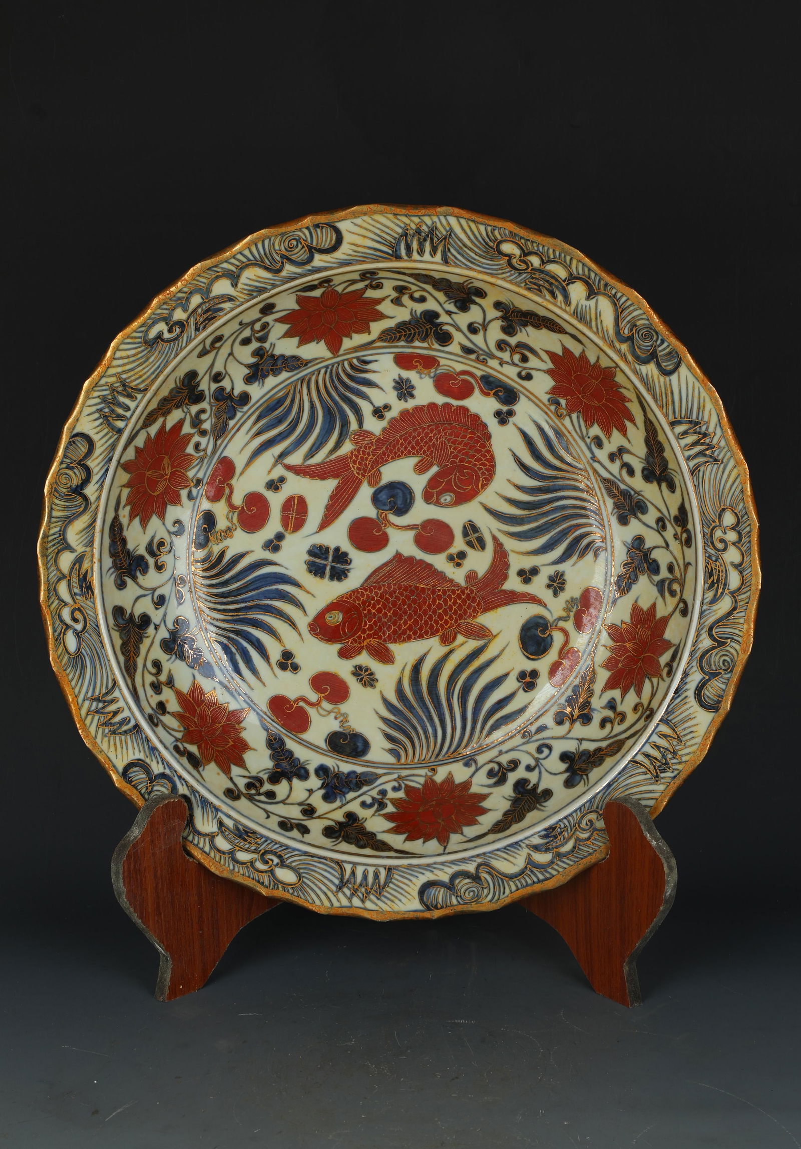 A Porcelain Charger: A Porcelain Charger. Eight character mark at base. Diameter: 15.5"