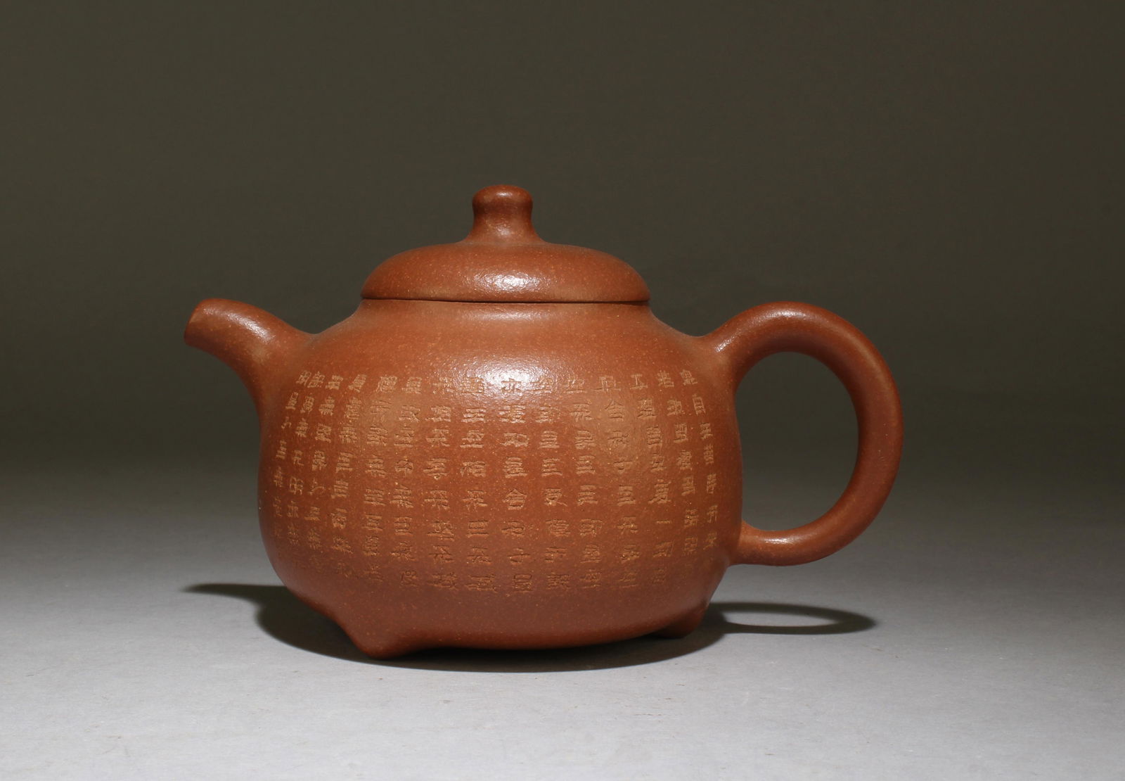 A Zisha Teapot: A Zisha Teapot. Seal mark at base. Height: 3.7" Length: 6"