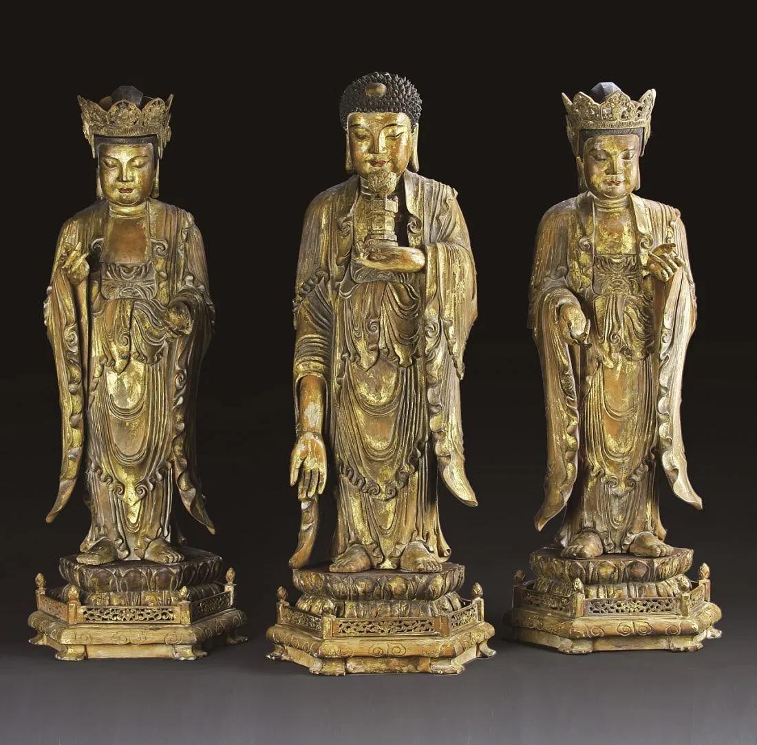 Ming Dynasty, A Group of Three Gold Pasted Buddha: Ming Dynasty, A Group of Three Gold Pasted Buddha Statues, from imperial palace. Each comes with a detachable wooden base. Height: 27" Length: 8.5"
