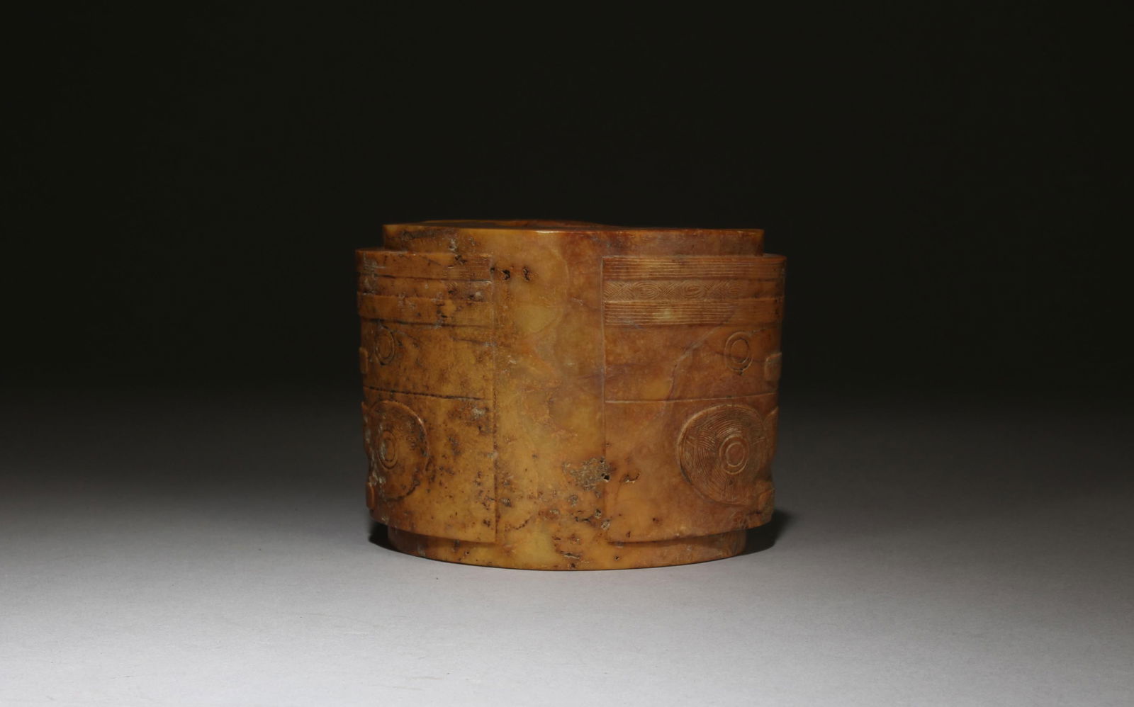 A Carved Jade 'Cong': A Carved Jade 'Cong'. Height: 3.1" Length: 4.15"