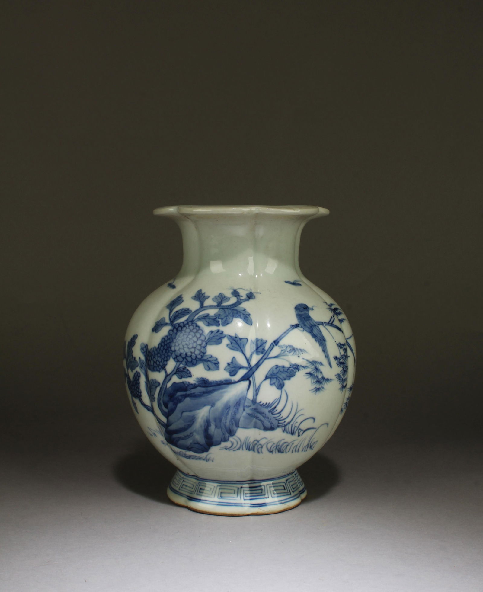 Blue & White Bird Landscape Begonia-Shaped Jar: A Blue & White Landscape Porcelain Jar, shaped like a flower. 'KangXi' mark at base. Height: 7.5"