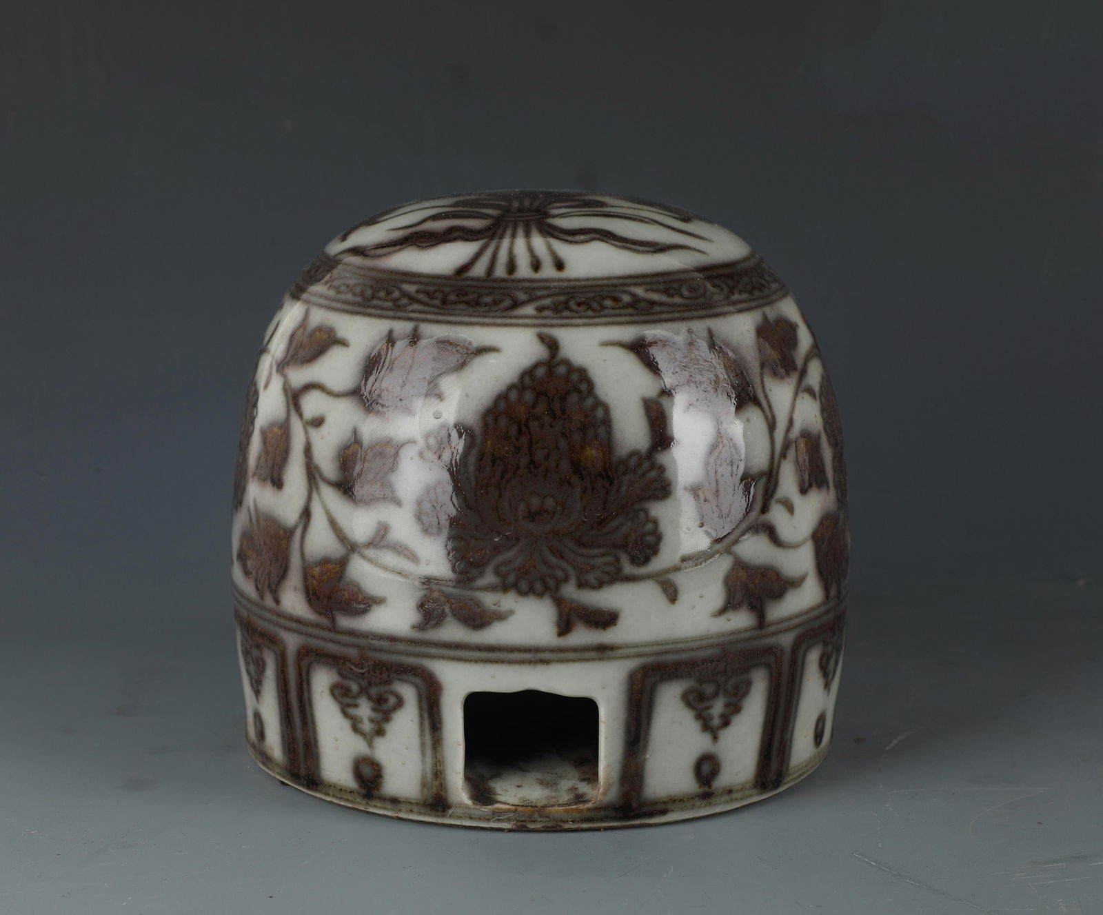 A Red Underglazed Porcelain Mongolian 'Bun': A Red Underglazed Porcelain Mongolian 'Bun'. Height: 6" Diameter: 6.5"