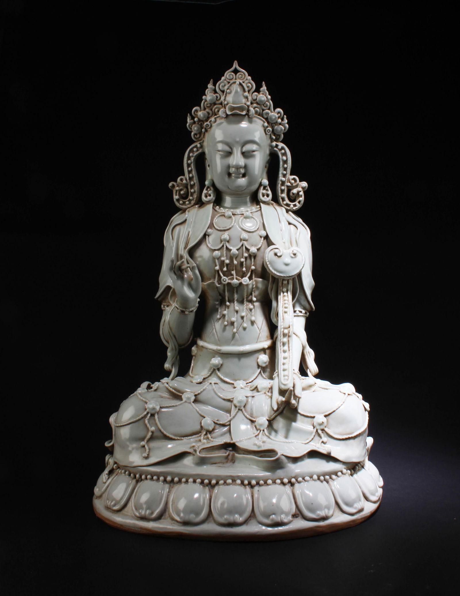 A YingQing Seated Guanyin Statue: A YingQing Seated Guanyin Statue. 'He ChaoZhong' mark. Height: 20.5" Length: 13.2"