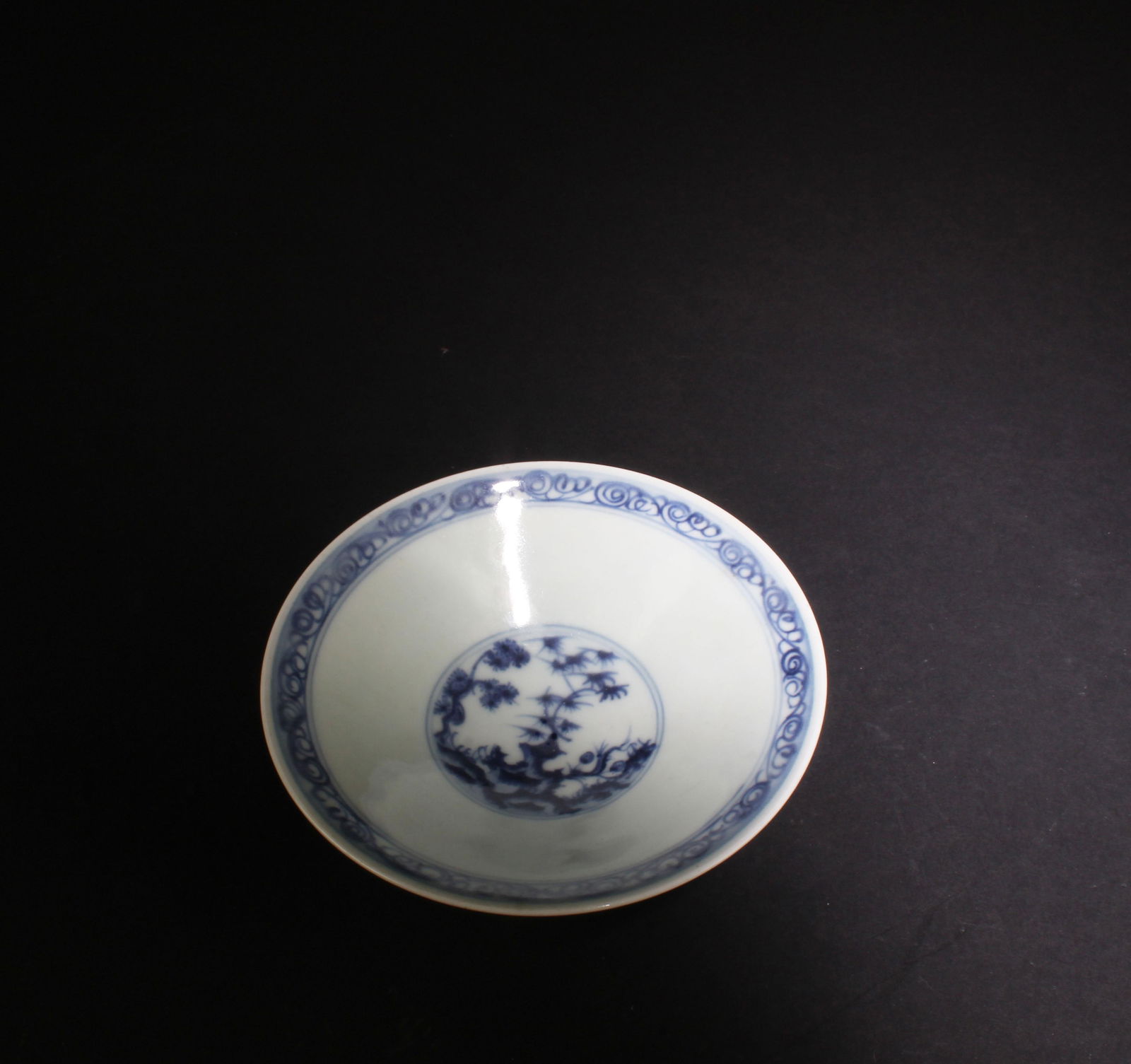 A Blue & White Bowl: A Blue & White Bowl. Four character mark at base. Diameter: 5" Height: 1.5"
