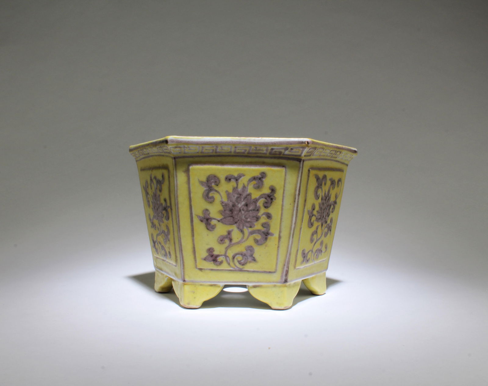 A Famille Jaune Hexagonal-shaped Porcelain Planter: A Famille Jaune Porcelain Planter. 'YongLe' mark at base. Height: 4.9" Length: 7.5"