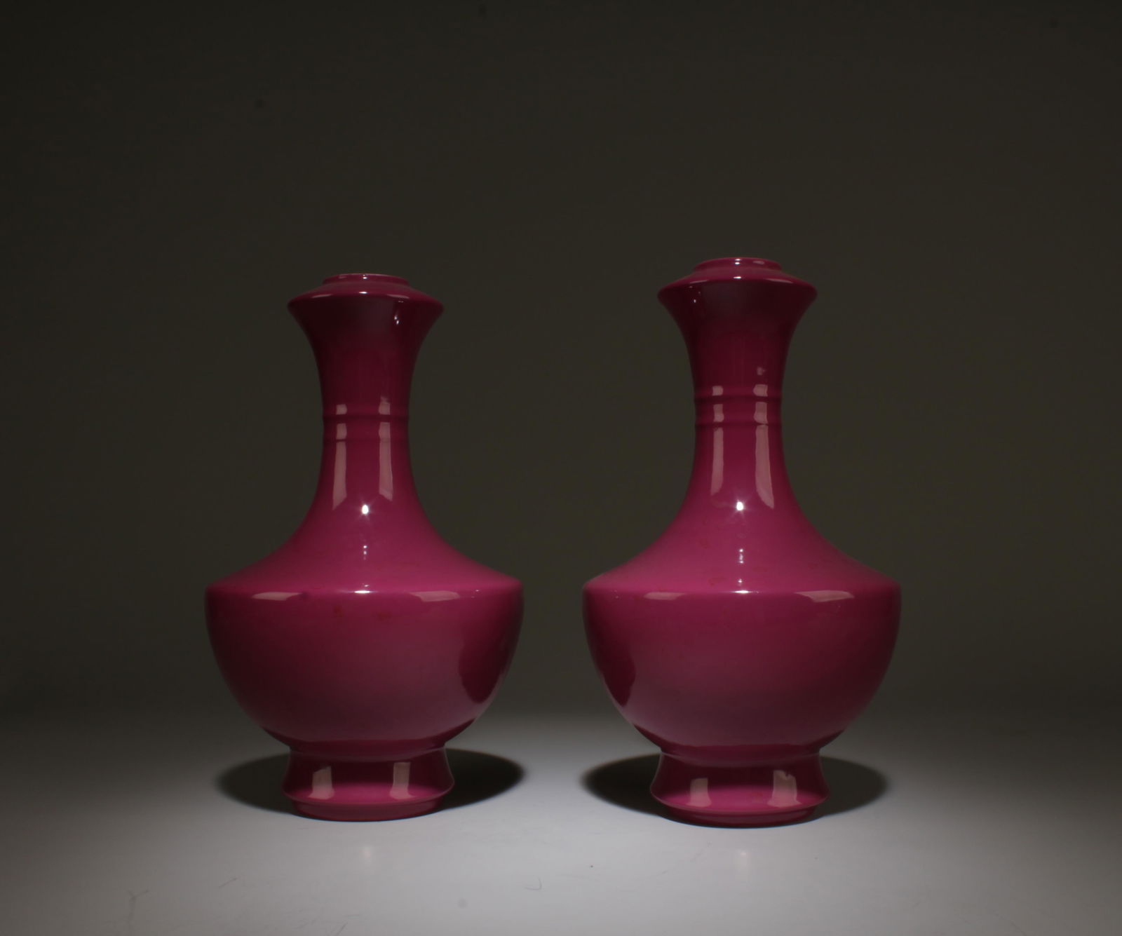 A Pair of Chinese Porcelain Vases: A Pair of Chinese Porcelain Vases. 'QianLong' mark at base. Height: 9.75"
