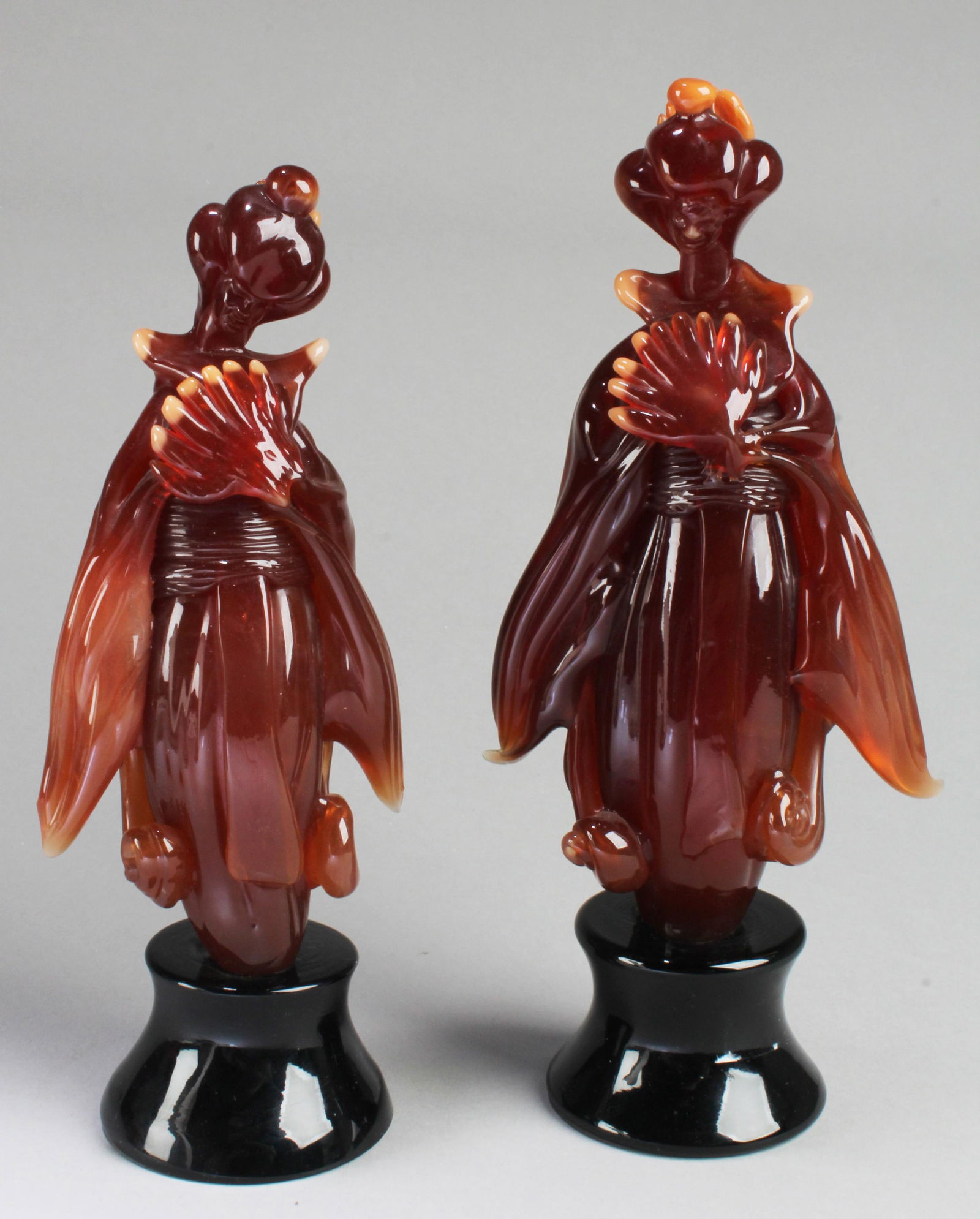 A Pair of Peking Glass Figurines: A Pair of Peking Glass Figurines. Height: 10.5"