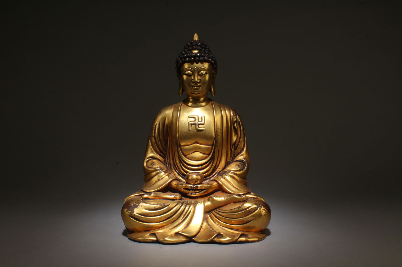 A Sitting Gilt Bronze Buddha Statue: A Sitting Gilt Bronze Buddha Statue. Dimensions: 11.5" x 8.3".