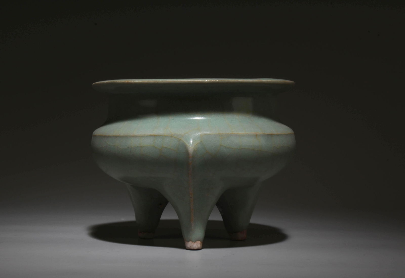 A Celadon Glazed Tripod Incense Burner: A Celadon Glazed Tripod Incense Burner. Dimensions: 3.8" x 5".