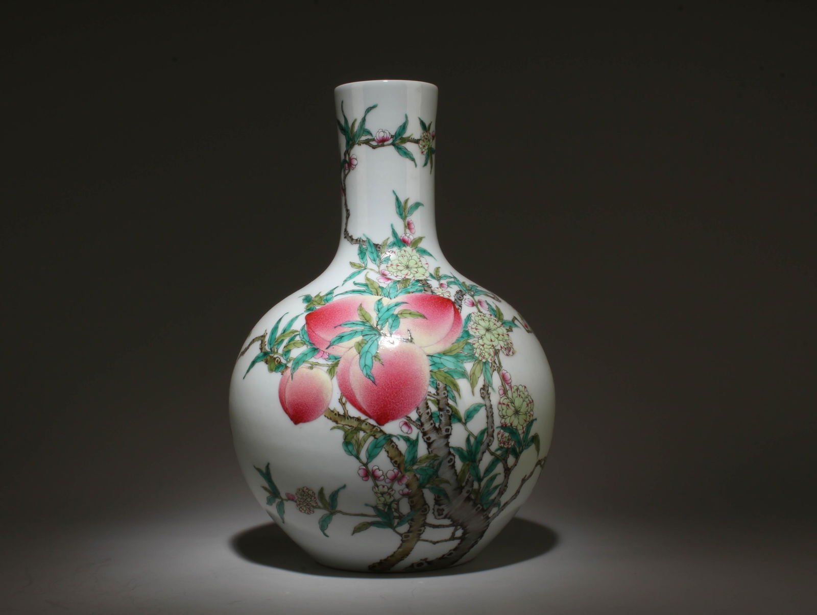 A Porcelain Vase with Peach Motif: A Porcelain Vase with Peach Motif. Dimensions: 16" x 8.75".
