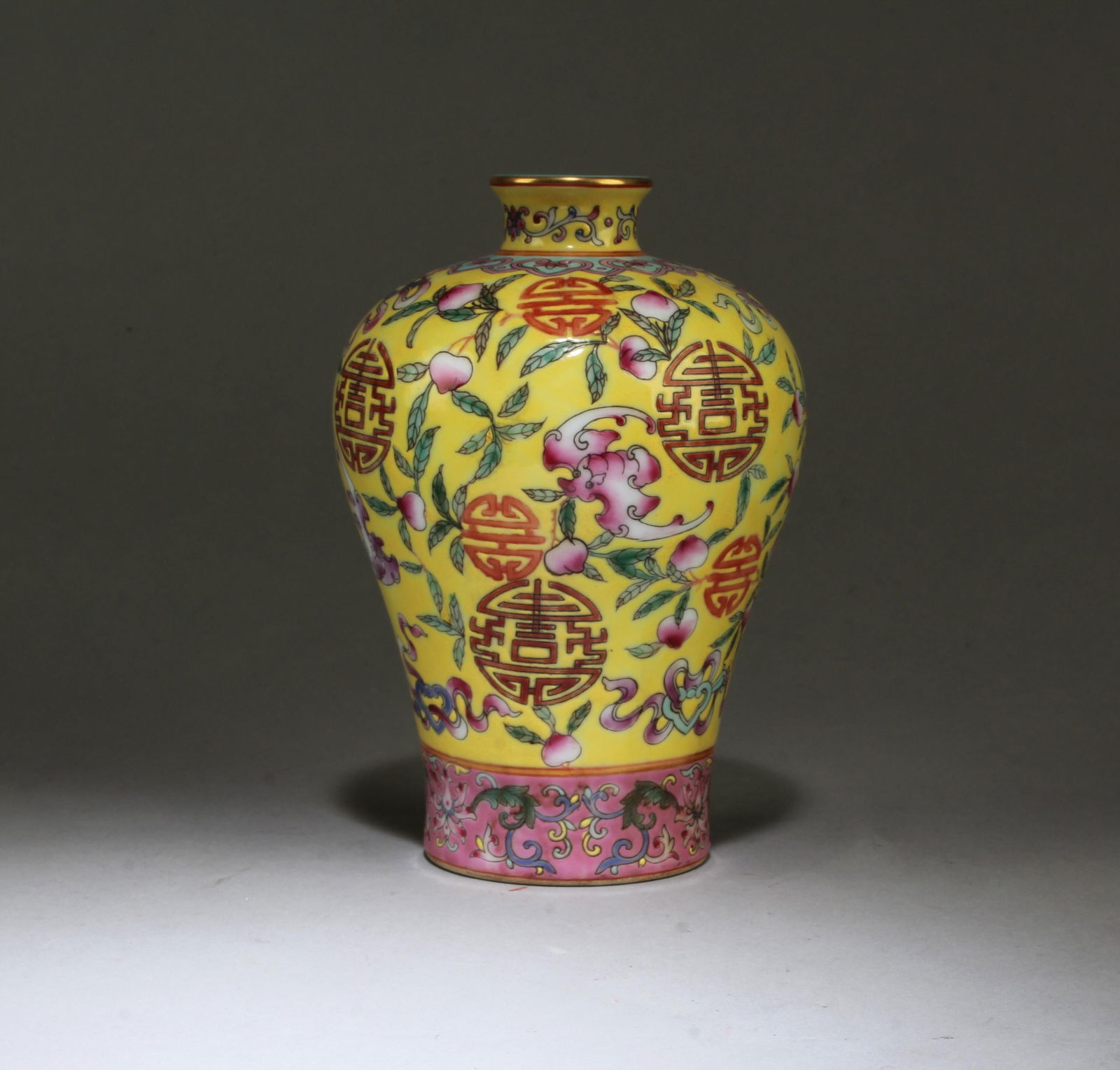 Chinese Famille Jaune Meiping Vase: Chinese Famille Jaune Meiping Vase. 'QianLong' mark at base. Height: 6.75"
