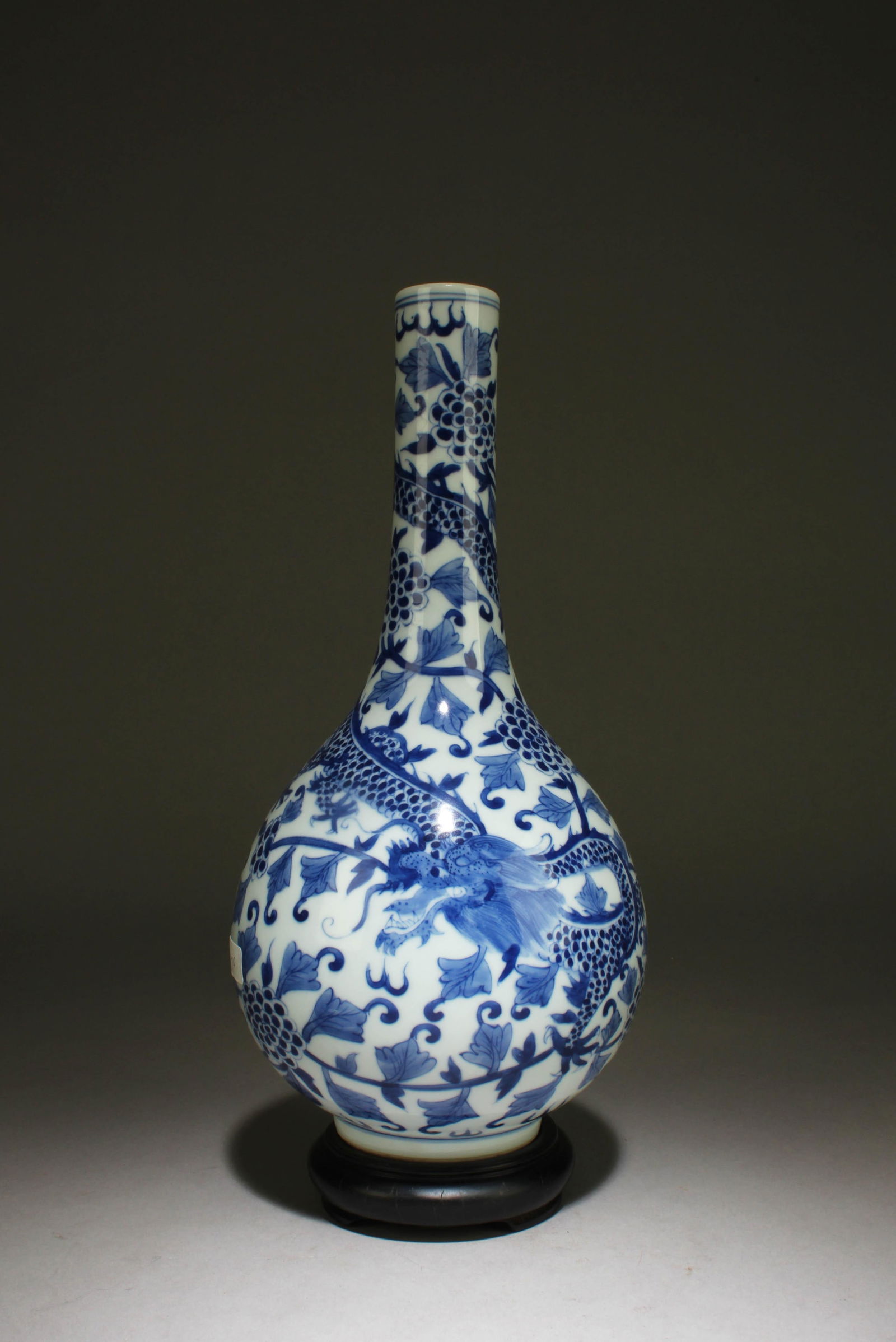 A Blue and White Vase with Stand: A Blue and White Vase with Stand. Dimensions: 11" x 5.5"
