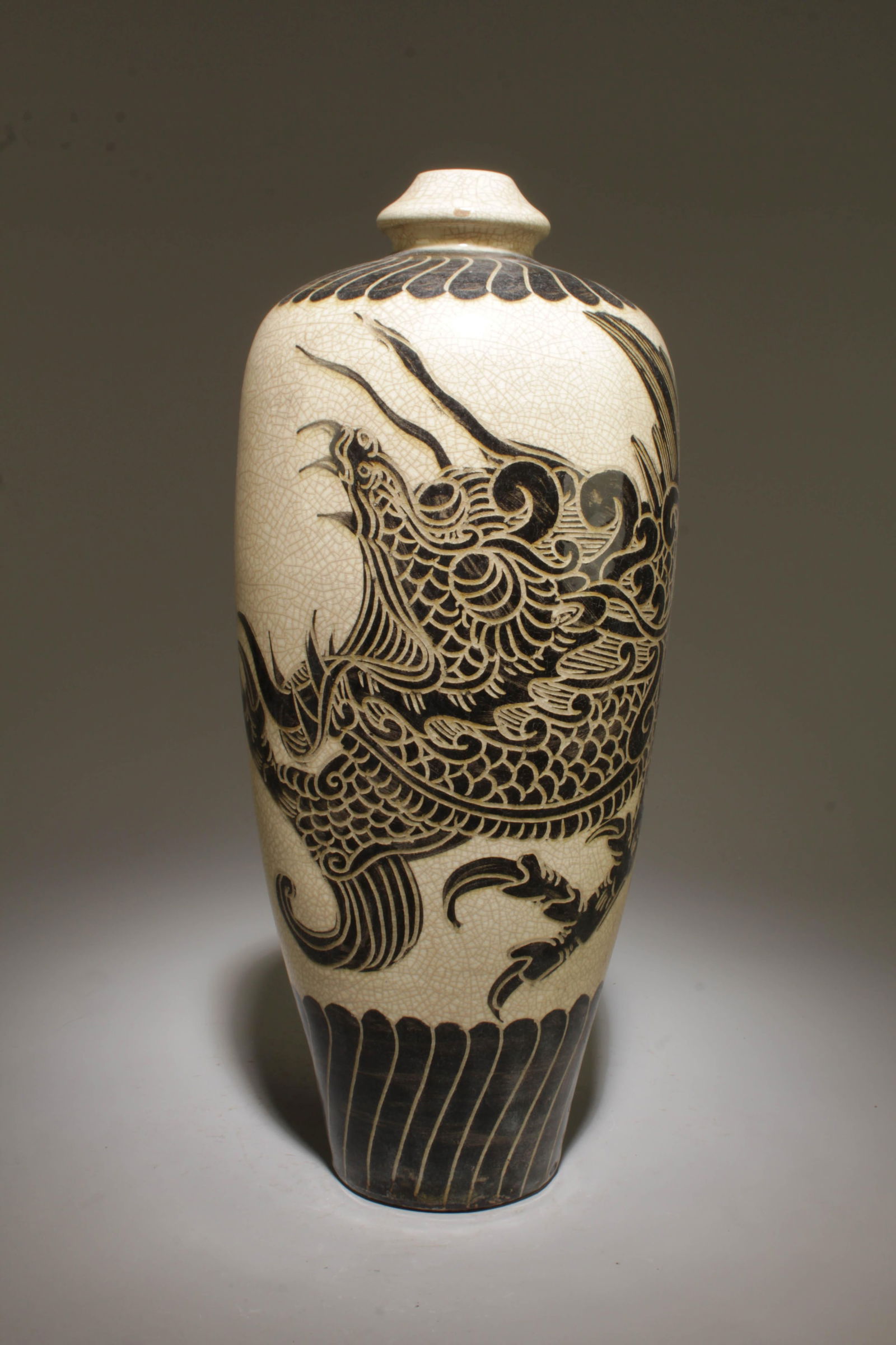 A Cizhou Vase: A Cizhou Vase. Dimension: 5" x 13".
