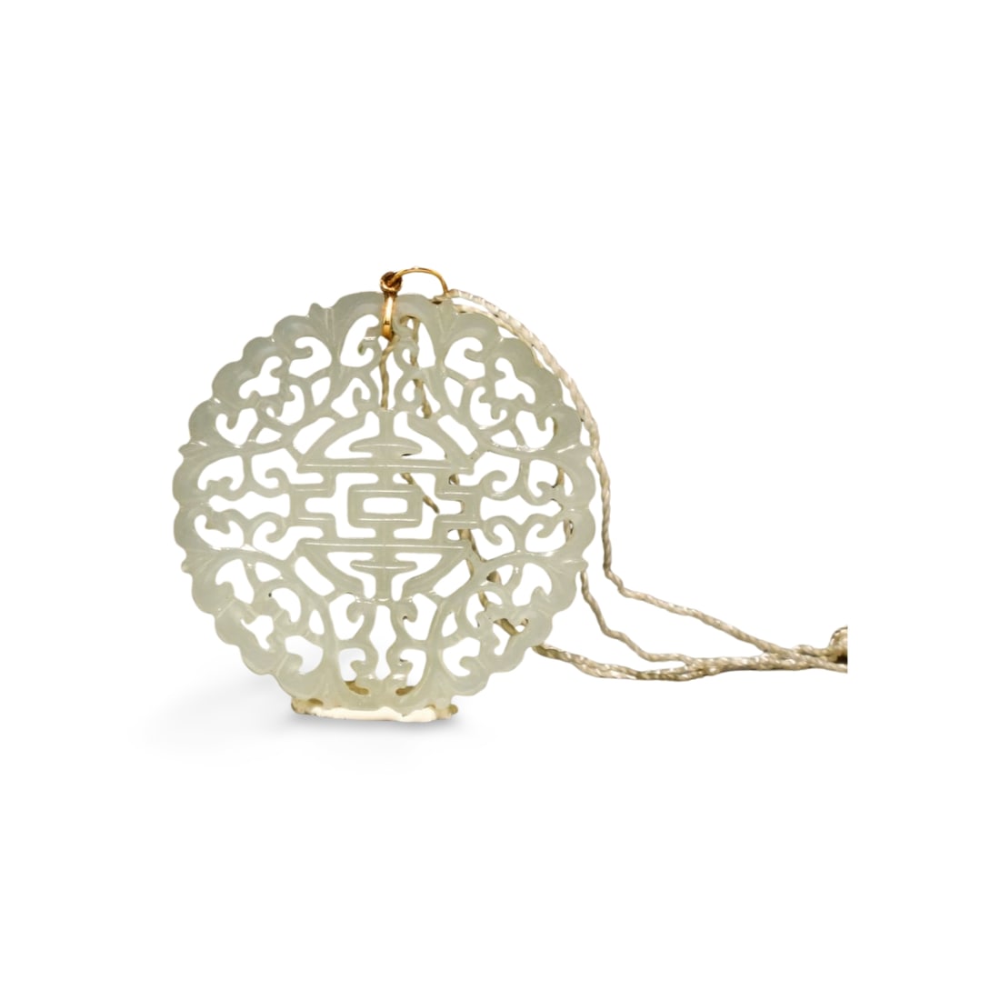 A Carved Jade Open Artwork Pendant: A Carved Jade Open Artwork Pendant. Diameter: 2.1"