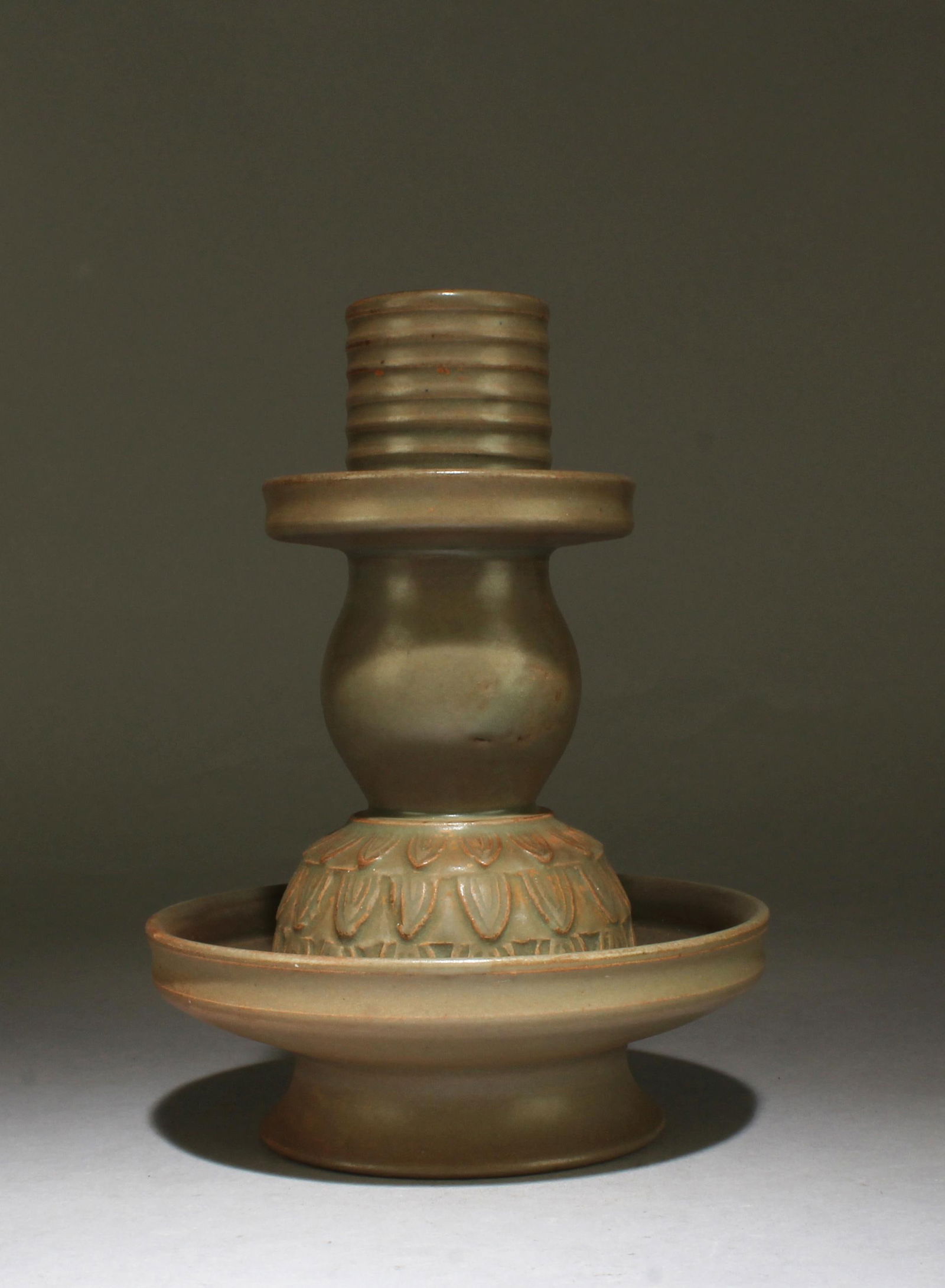 A Porcelain Ornament: A Porcelain Ornament. Height: 7.1" Diameter: 4.7"