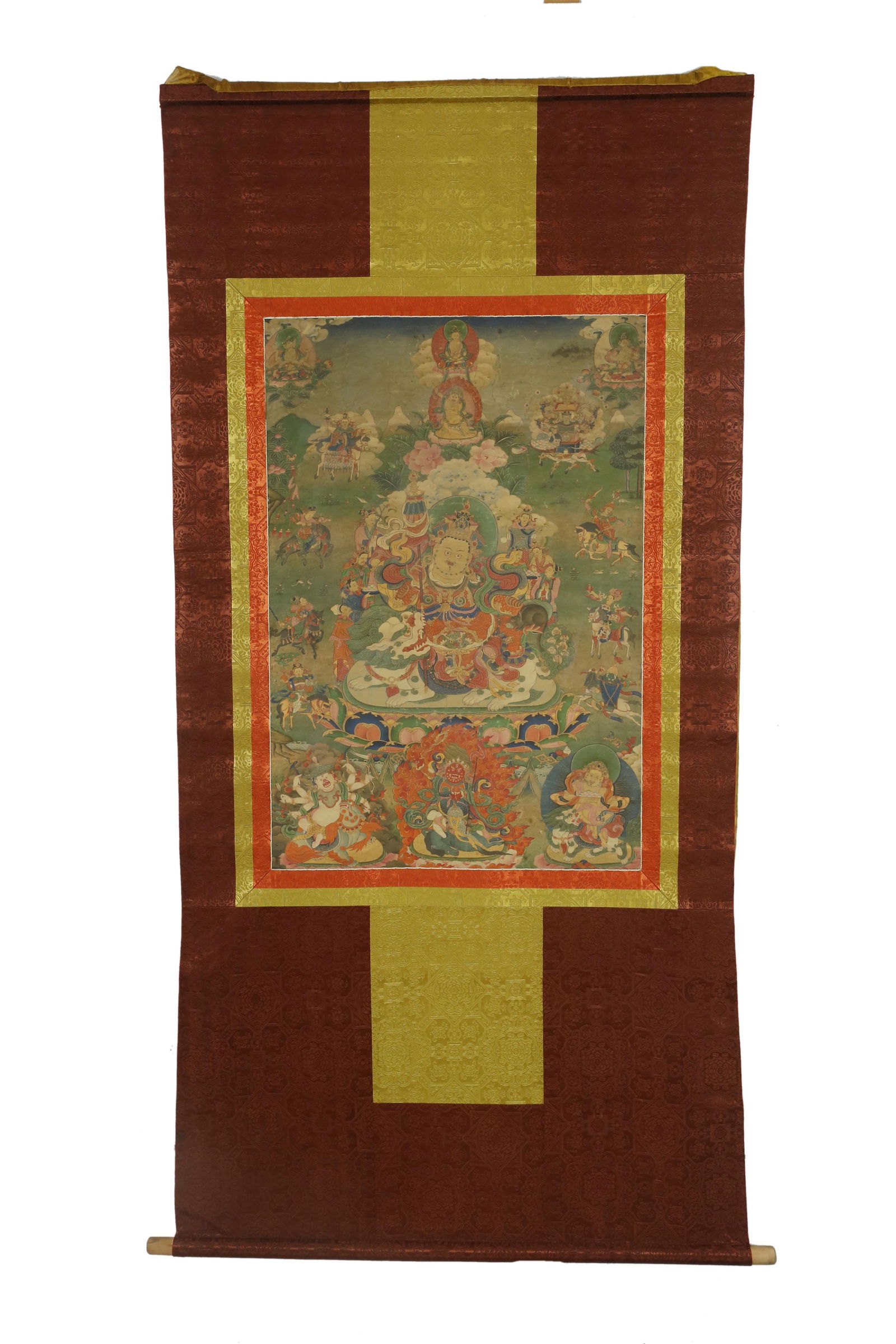 A Tibetan Thangka: A Tibetan Thangka. Height :33.4" Length: 17.7" ( Inner Picture) Length: 27" Height: 60" (total)