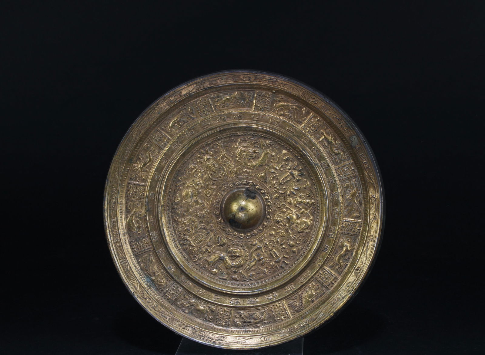 Chinese Gilt Bronze Mirror: Chinese Gilt Bronze Mirror. Diameter: 7.75"