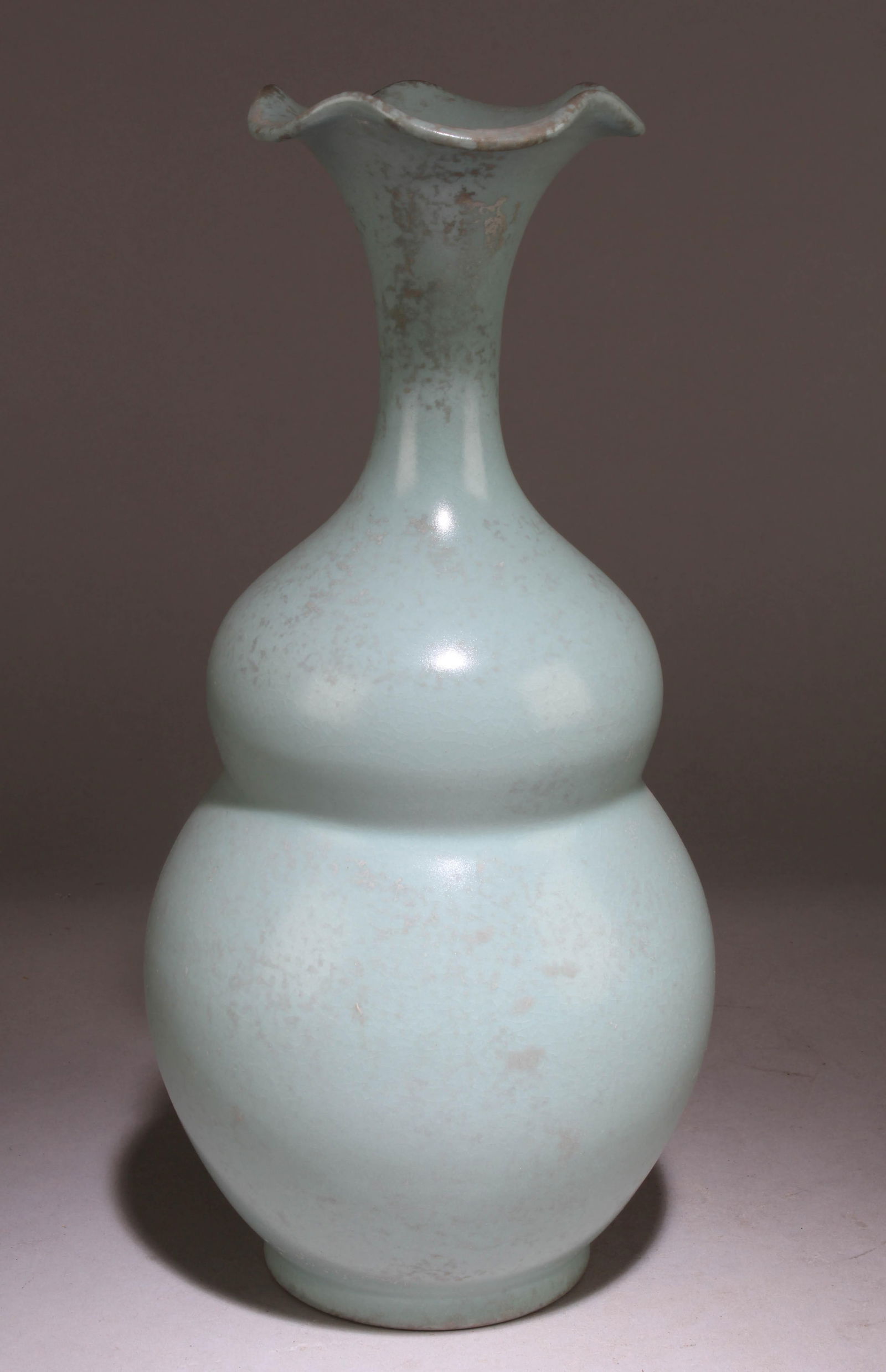 A Chinese Ruyao Vase: A Chinese Ruyao Vase. Dimension: 12" x 5.5".