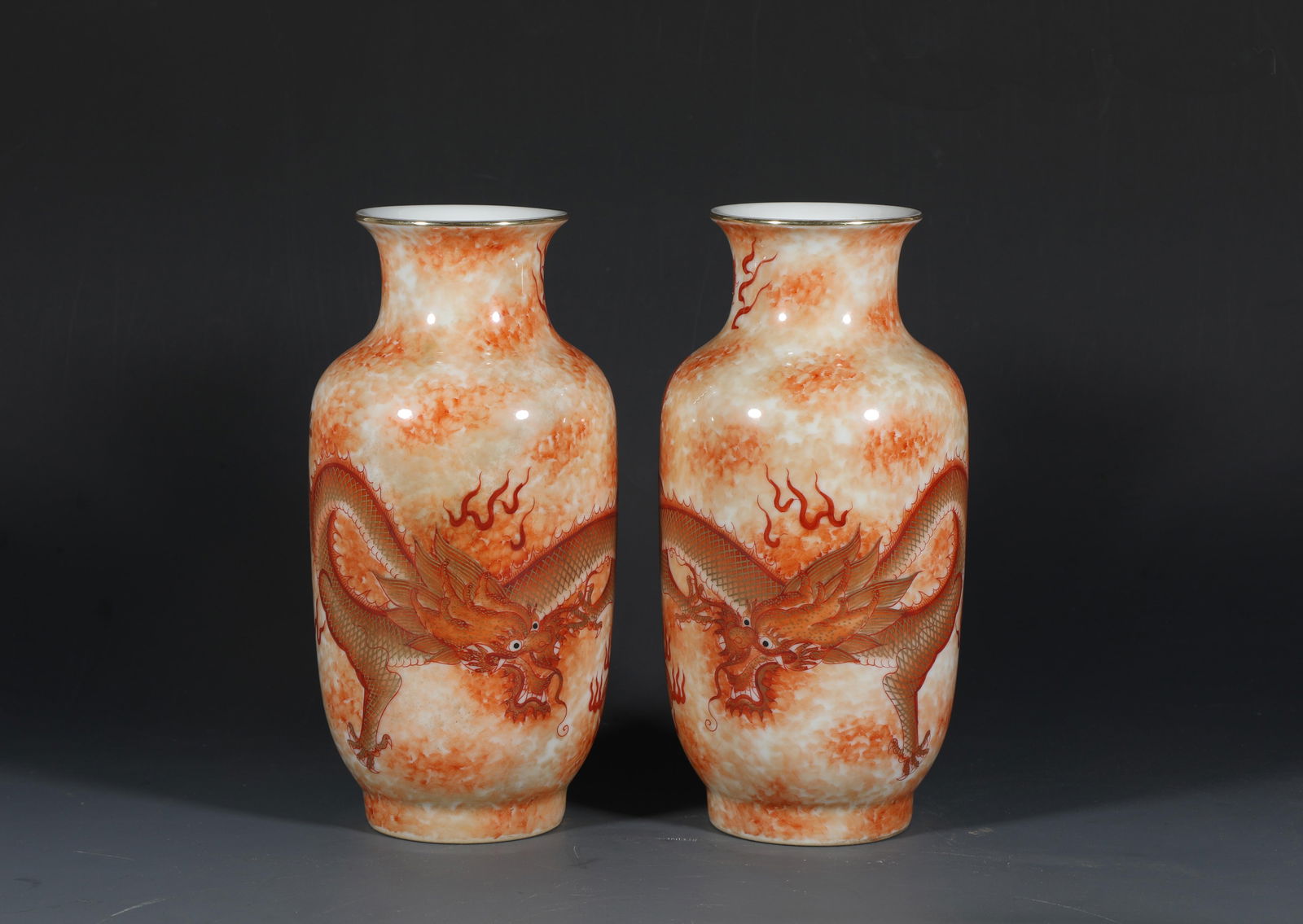 A Pair of Chinese Vase with a Dragon Design: A Pair of Chinese Vase with a Dragon Design. Dimension: 8.8" x 4.25".