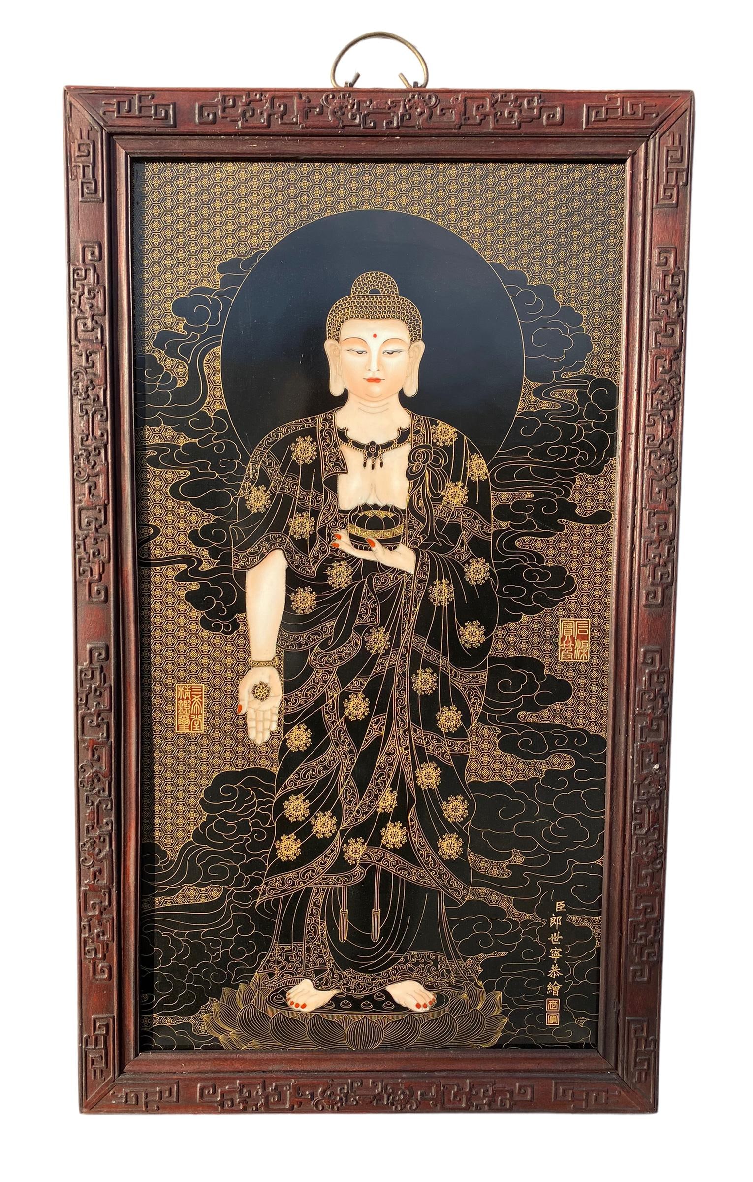 A Framed Porcelain Plaque: A Framed Porcelain Plaque, depicting a portrait of the Buddha. Height: 35.25" Length: 20.5"