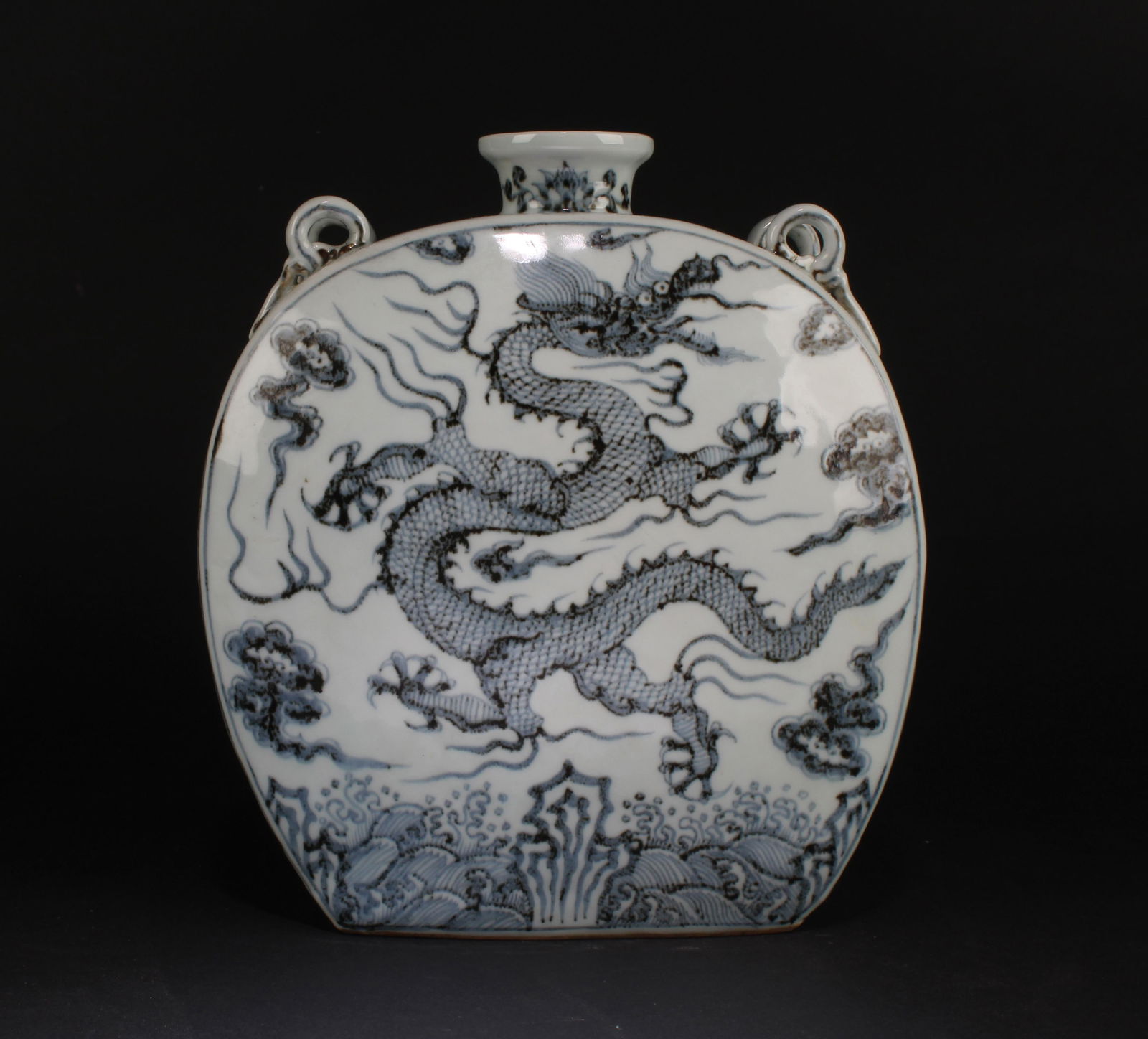 A Porcelain Moonflask Vase: A Porcelain Moonflask Vase. 'ShangChi' mark on body. Height: 10.75" Length: 9.5"