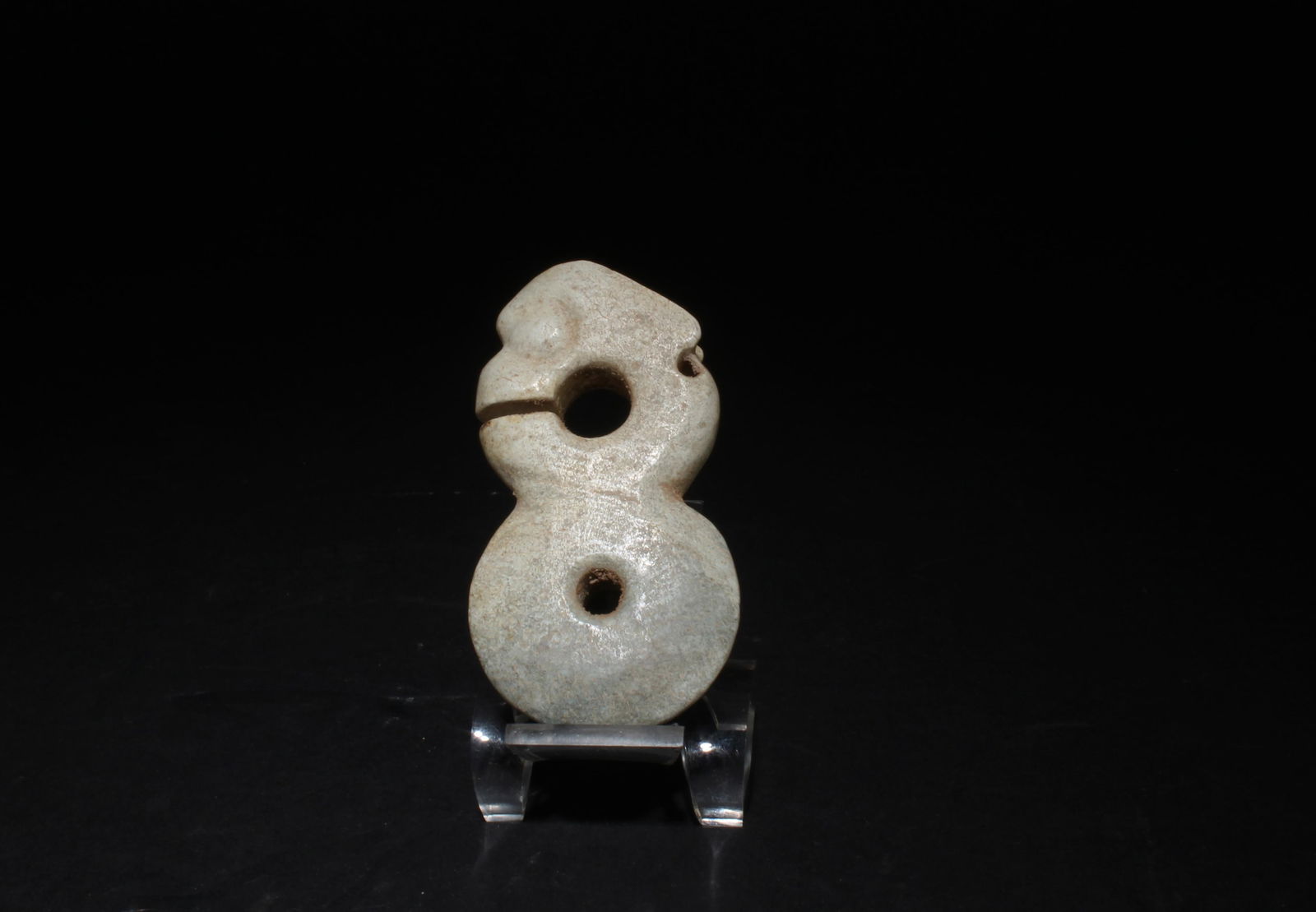 A Carved Jadestone Ornament: A Carved Jadestone Ornament. Height: 3"