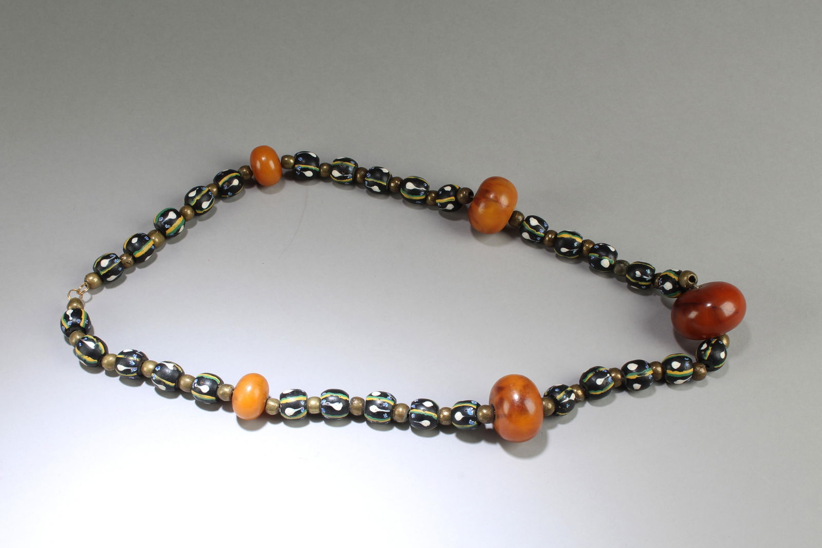 A Beaded Necklace: A Beaded Necklace. Length: 15.5"