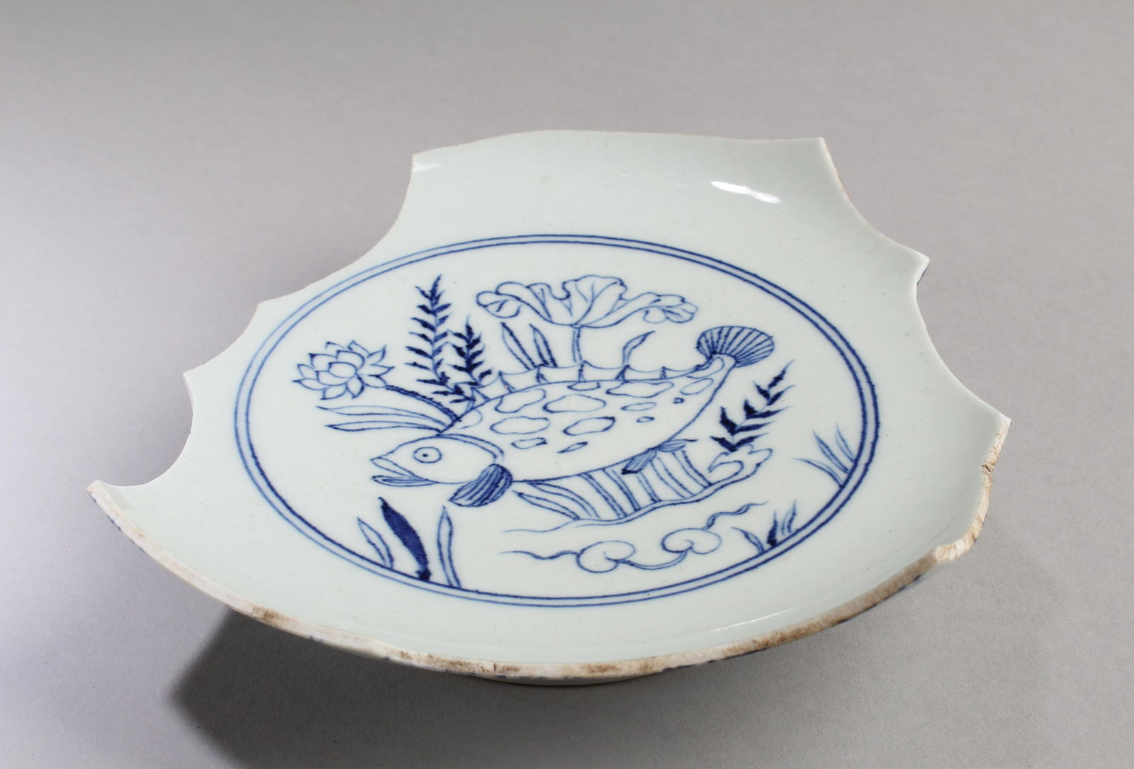 Fragment of Blue & White Porcelain Plate: Fragment of Blue & White Porcelain Plate showing 'ChengHua' mark. Length: 6"