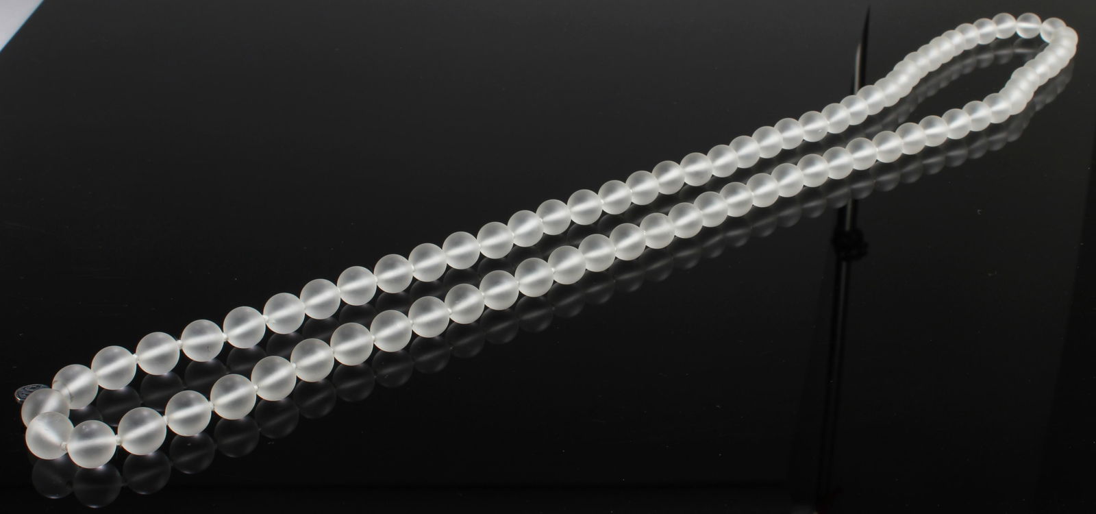 A Crystal Necklace: A Crystal Necklace, 79 beads. Diameter: 0.5" (bead)