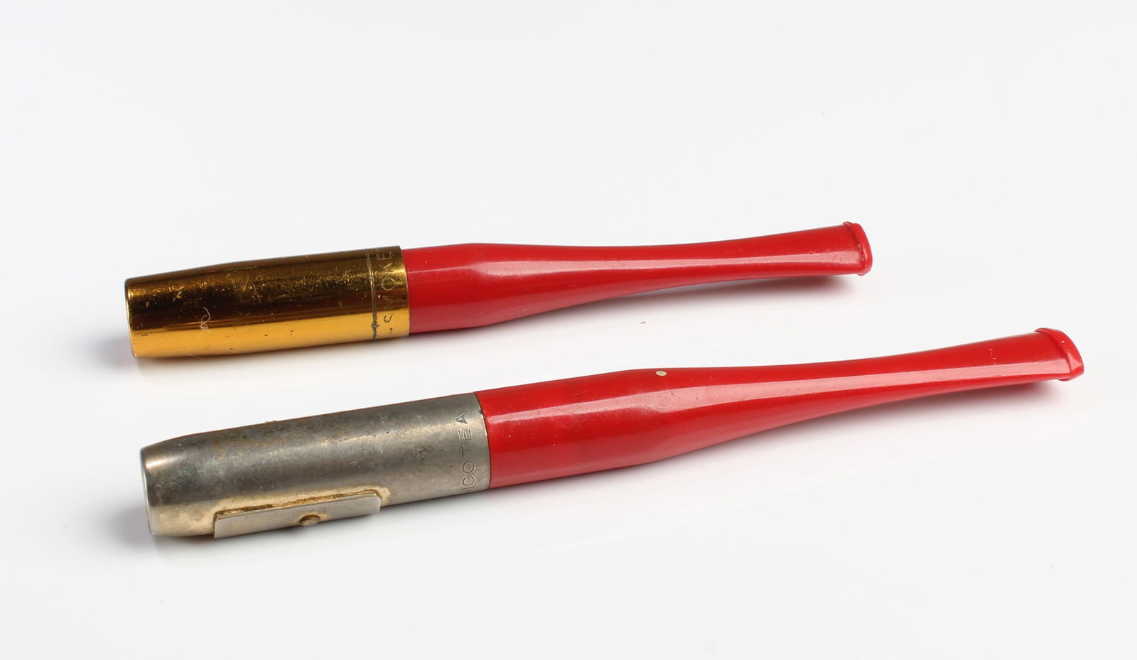 Two Cigarette Holders: Two Cigarette Holders. Length: 3.75", 4.5"