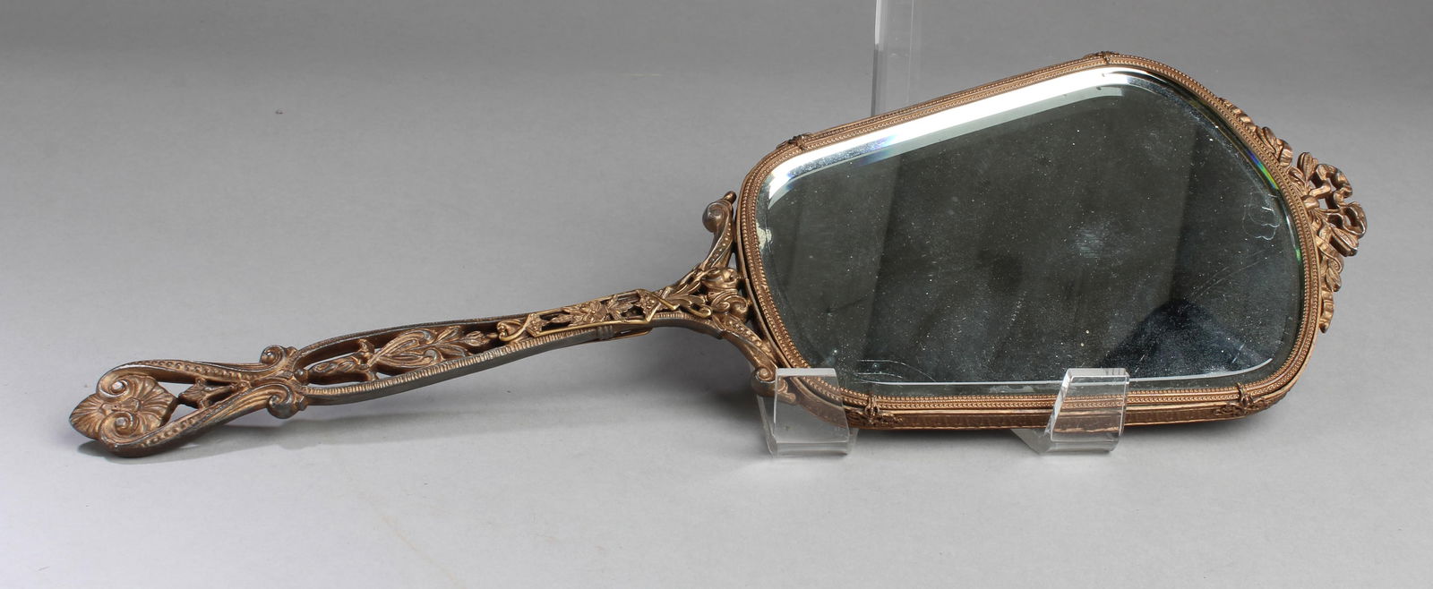 A Mirror: A Mirror. Length: 13.75"