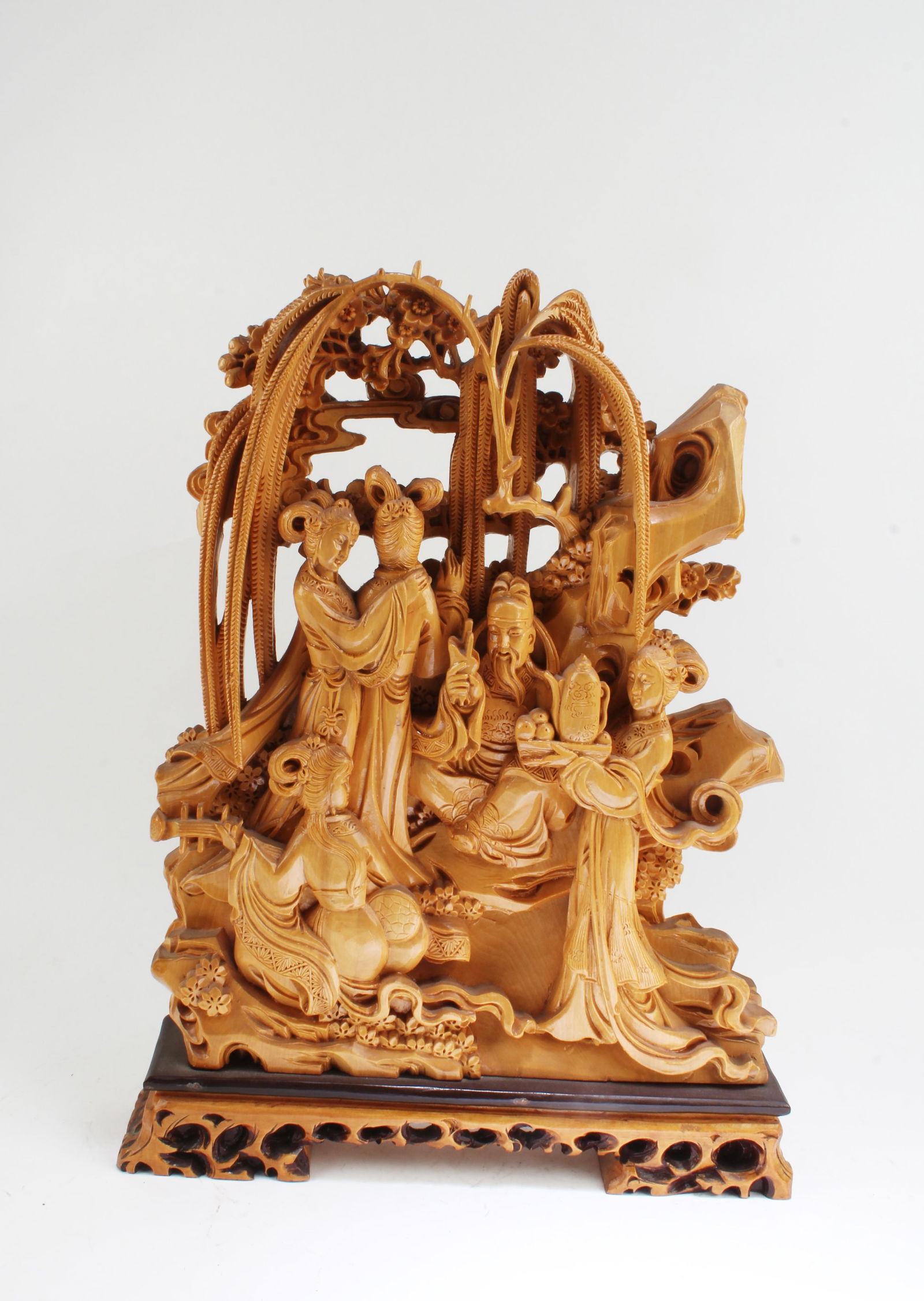 A Carved Wooden Display Ornament: A Carved Wooden Display Ornament. Comes fitted with a wooden stand. Height: 15.75" (with stand)