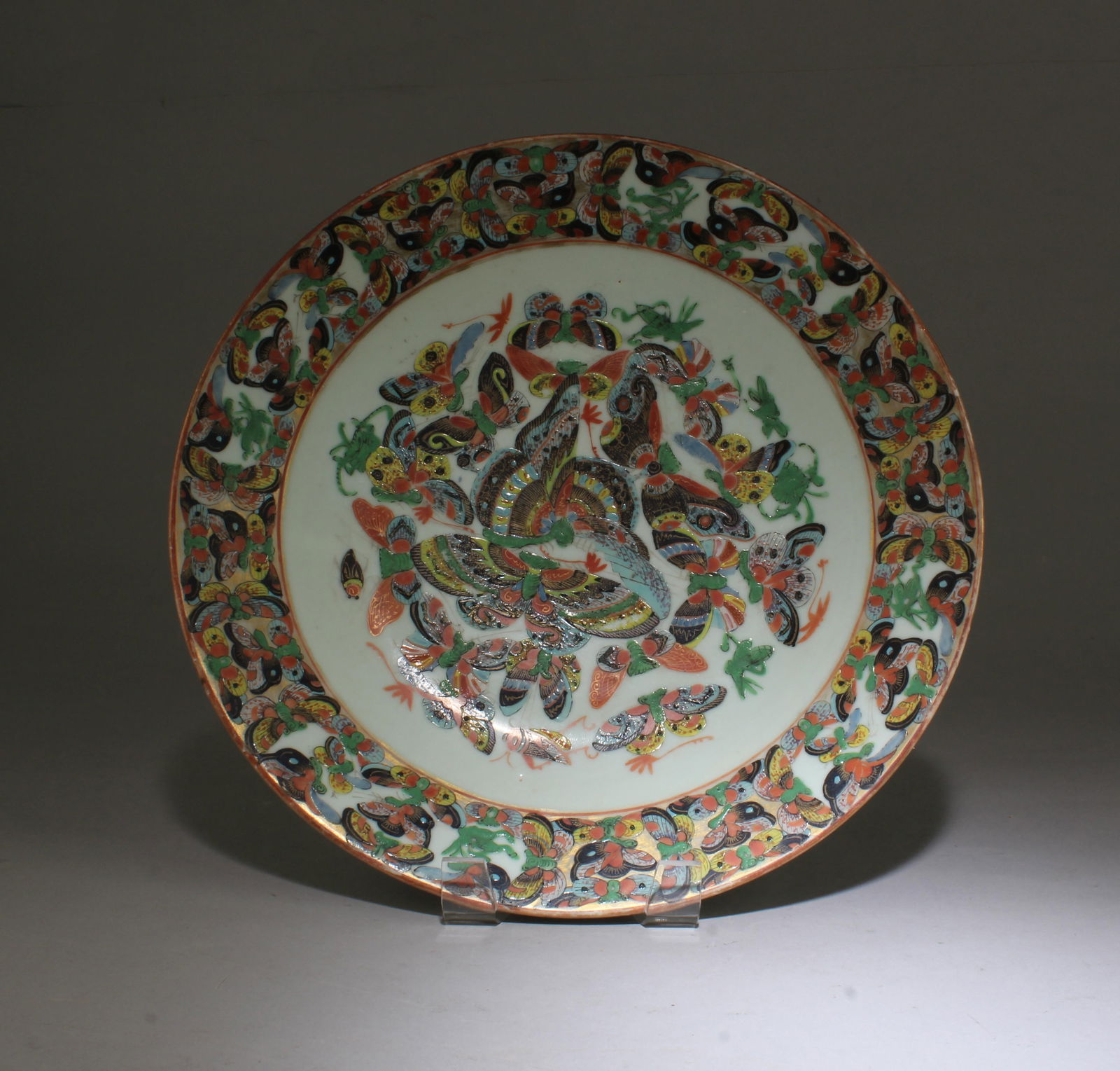 A Porcelain Plate, 19th Century: A Porcelain Plate. Diameter: 12"
