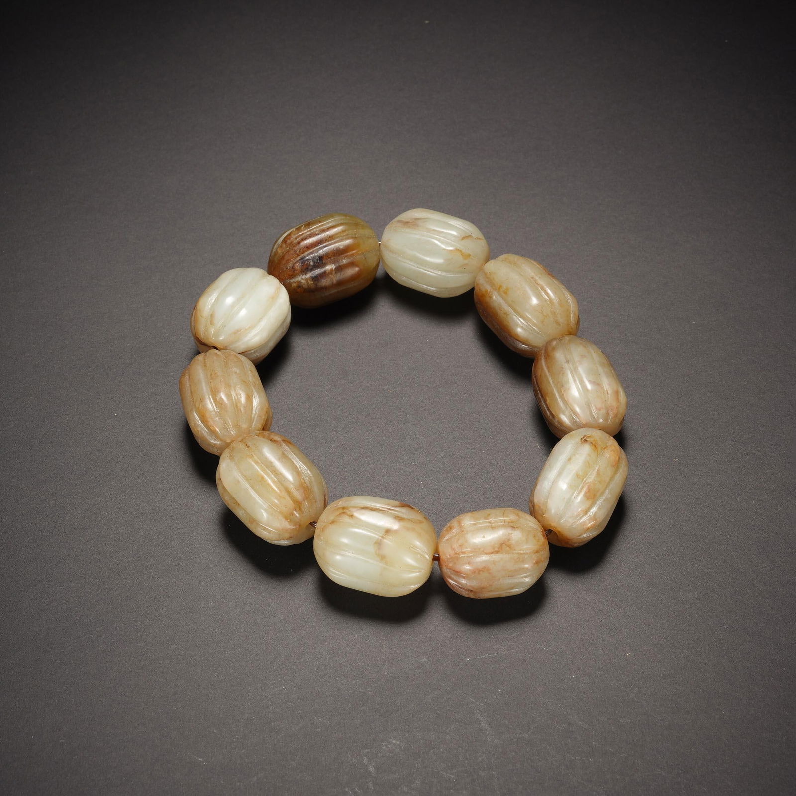 Carved Jade Beaded Bracelet: Carved Jade Beaded Bracelet. Diam.0.63" Height:0.87"