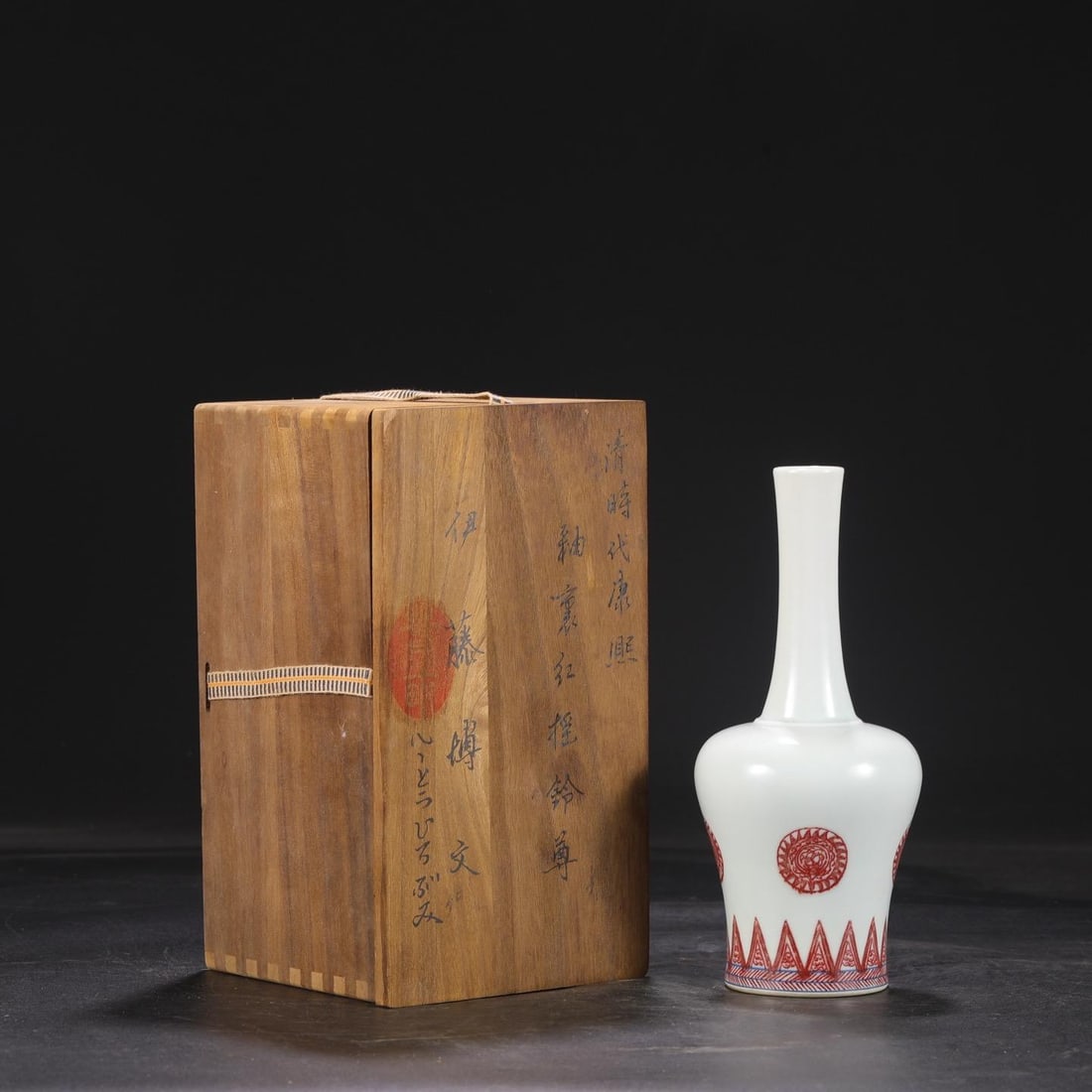 A Red Underglazed Bell-Shaped Vase: A Red Underglazed Bell-Shaped Vase. Height: 9.06in; Diameter: 3.74in.