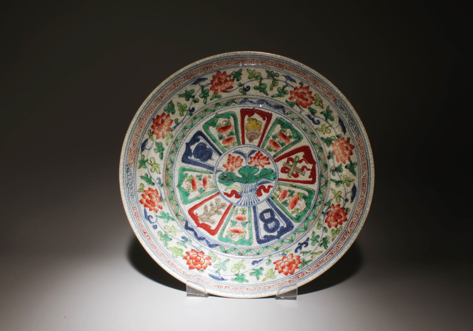 A Wucai Plate: A Wucai Plate. Dimensions: 13.4" x 2.5".