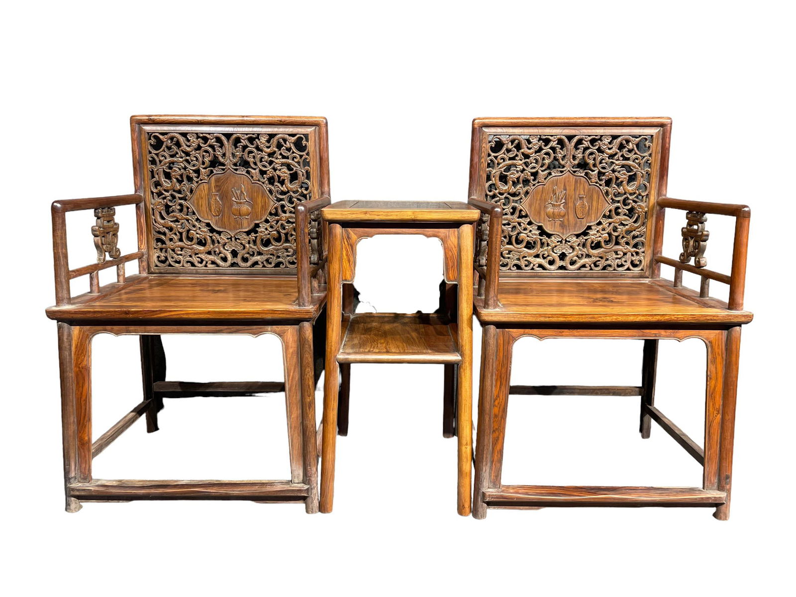 A Three Piece Hardwood Chair Set: A Three Piece Hardwood Chair Set, comprises two chair and a tea table. Chair Dimension: 23.62in(L) x 18.9in (W) x 34.65in (H) Tea Table Dimension: 17.72in (L) x 13.78in (W) x 28.35in (H).