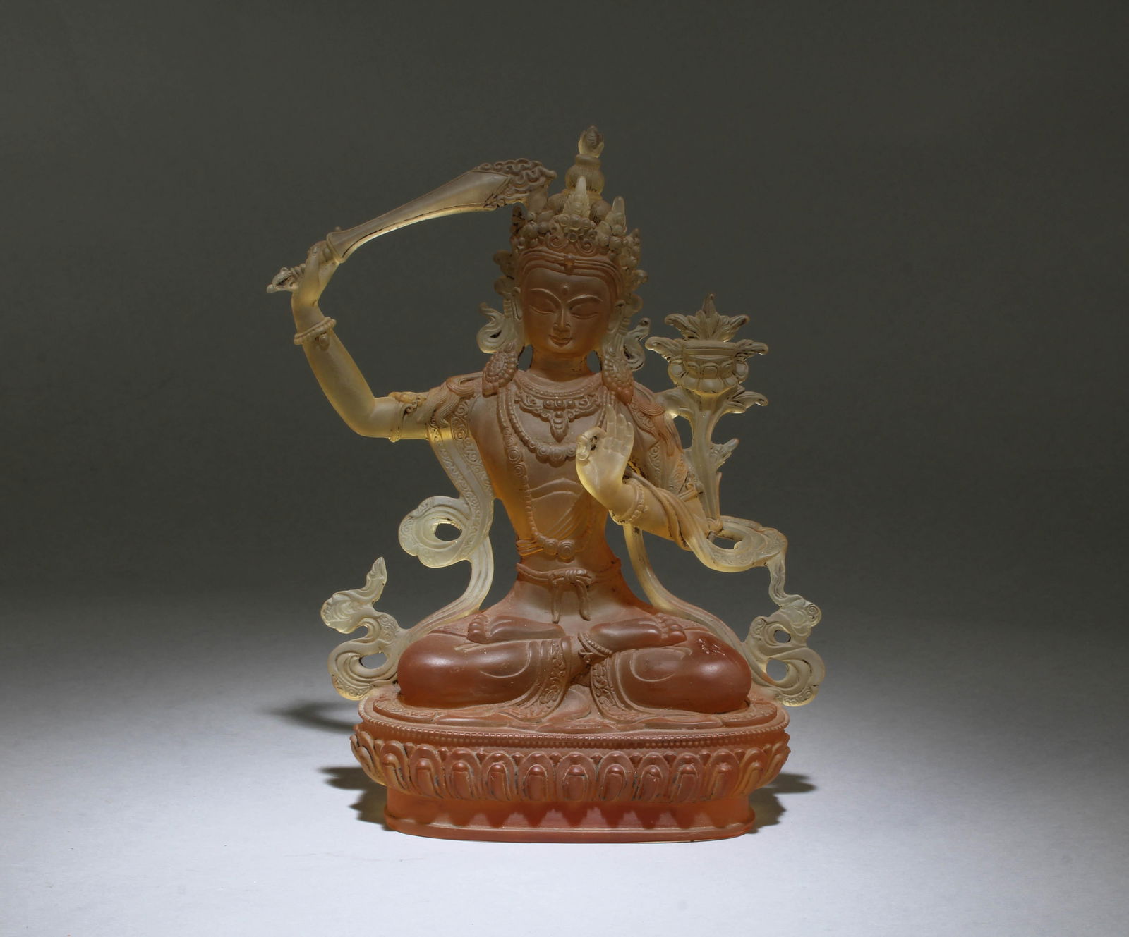 A Chinese Peking Glass Bodhisattva Statue: A Chinese Peking Glass Bodhisattva Statue. Height: 8.25"