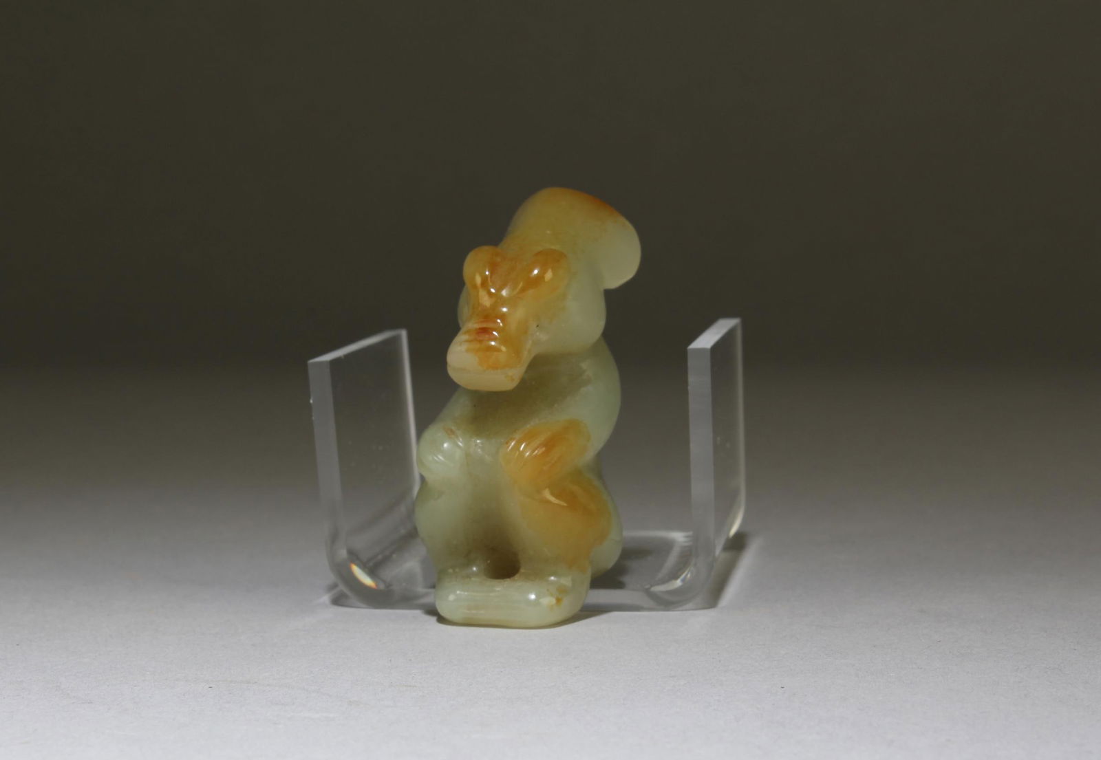 A Nephrite Jade Ornament: A Nephrite Jade Ornament. Length: 2"