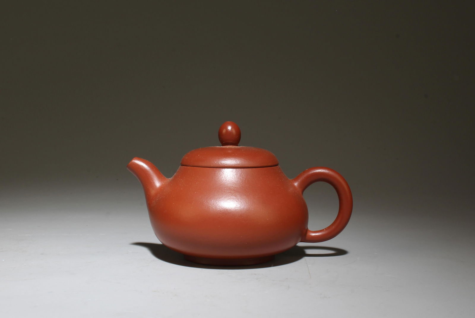 A Zisha Teapot: A Zisha Teapot. Dimensions: 4.3" x 2.5".