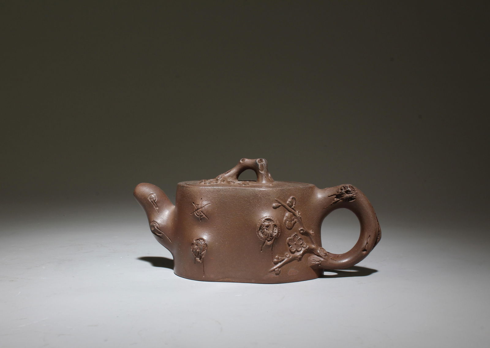 A Zisha Teapot: A Zisha Teapot. Dimensions: 5.5" x 2.5".
